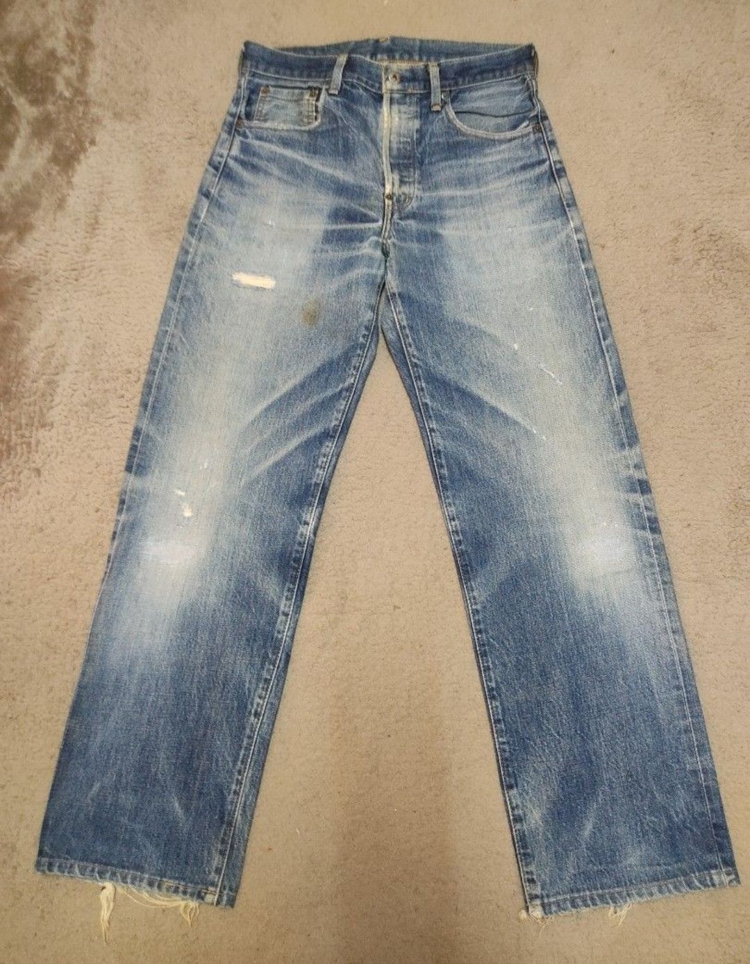 Vintage Levis 702 distressed buckle back Jeans