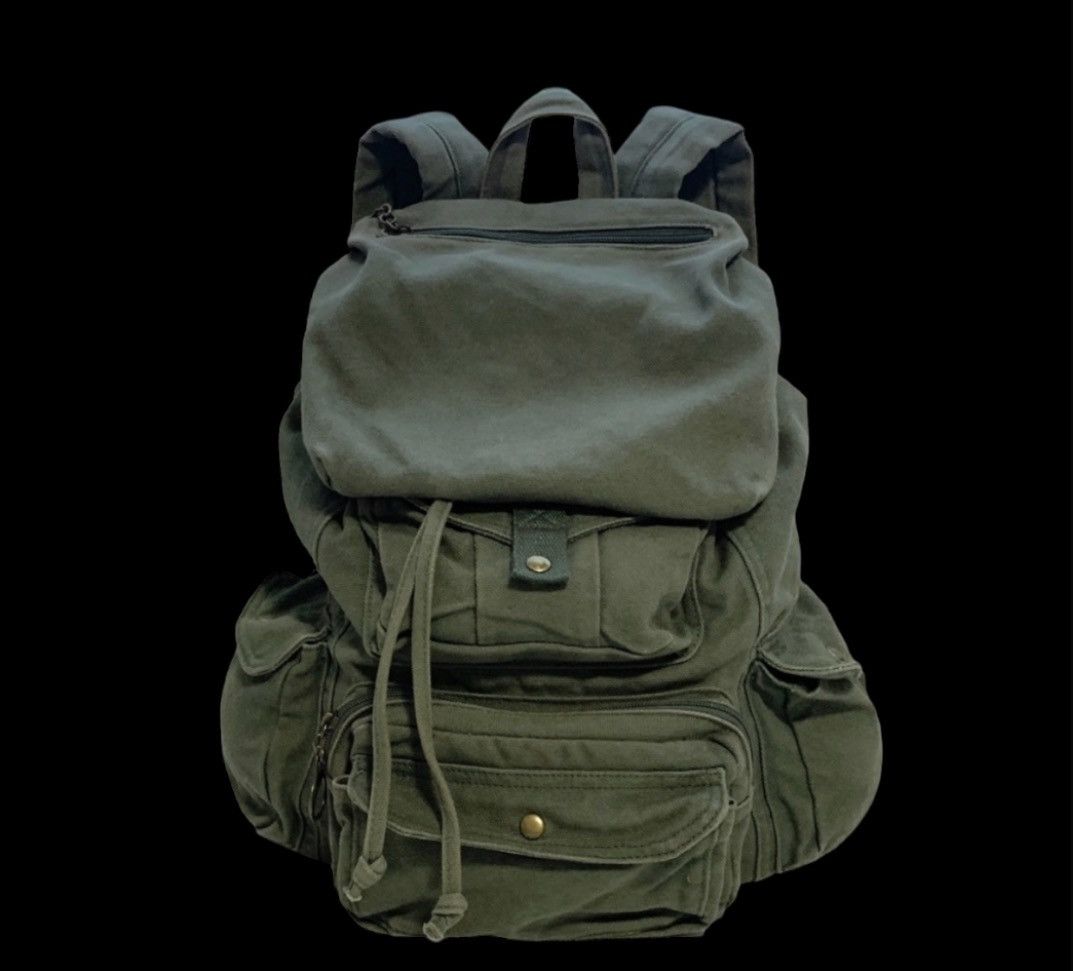 image of Archival Clothing x Military Multi Pocket Cargo Backpack in Army, Men's