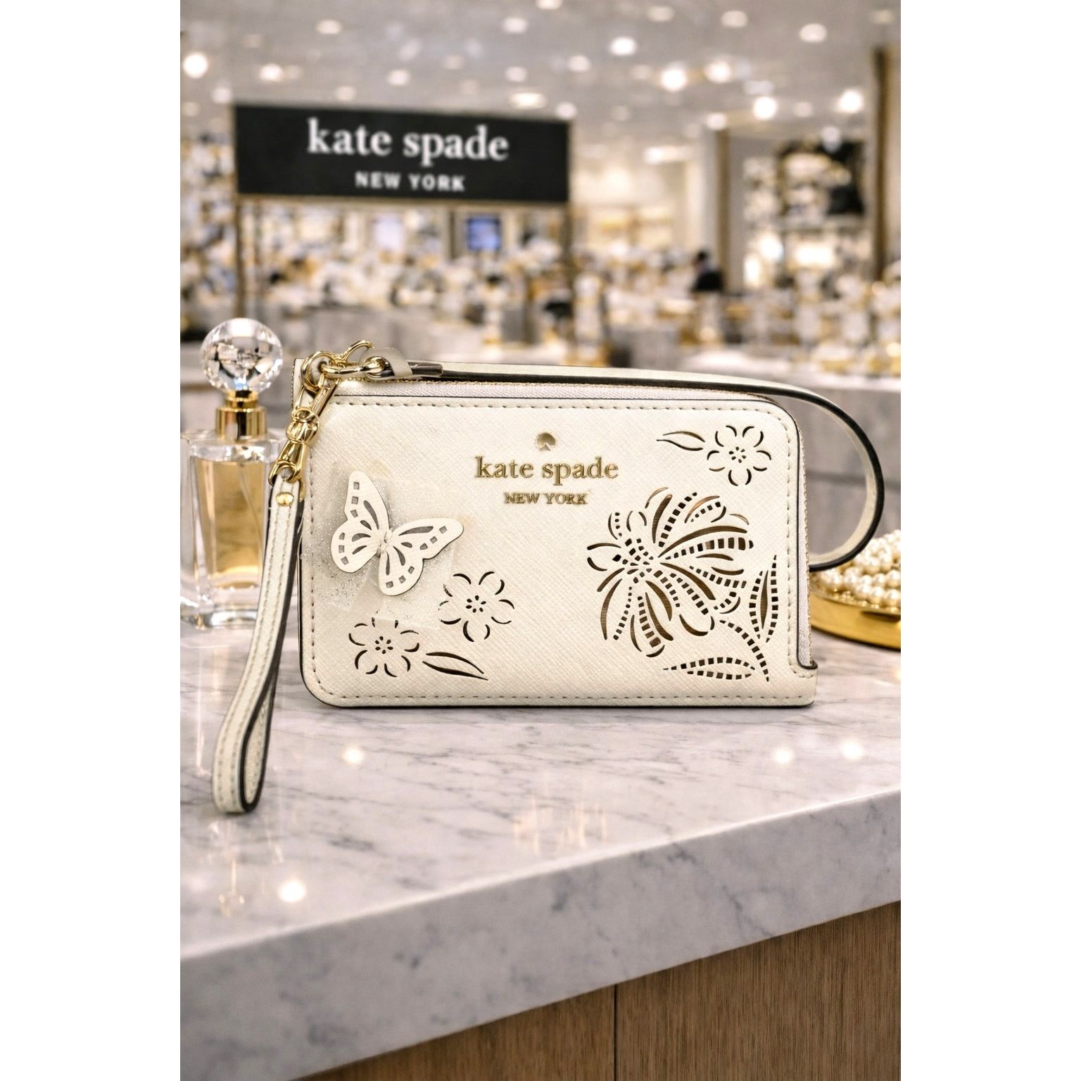 Kate Spade Kate Spade Madison Perforated Small Wristlet Merinque Size ONE SIZE - 1 Thumbnail