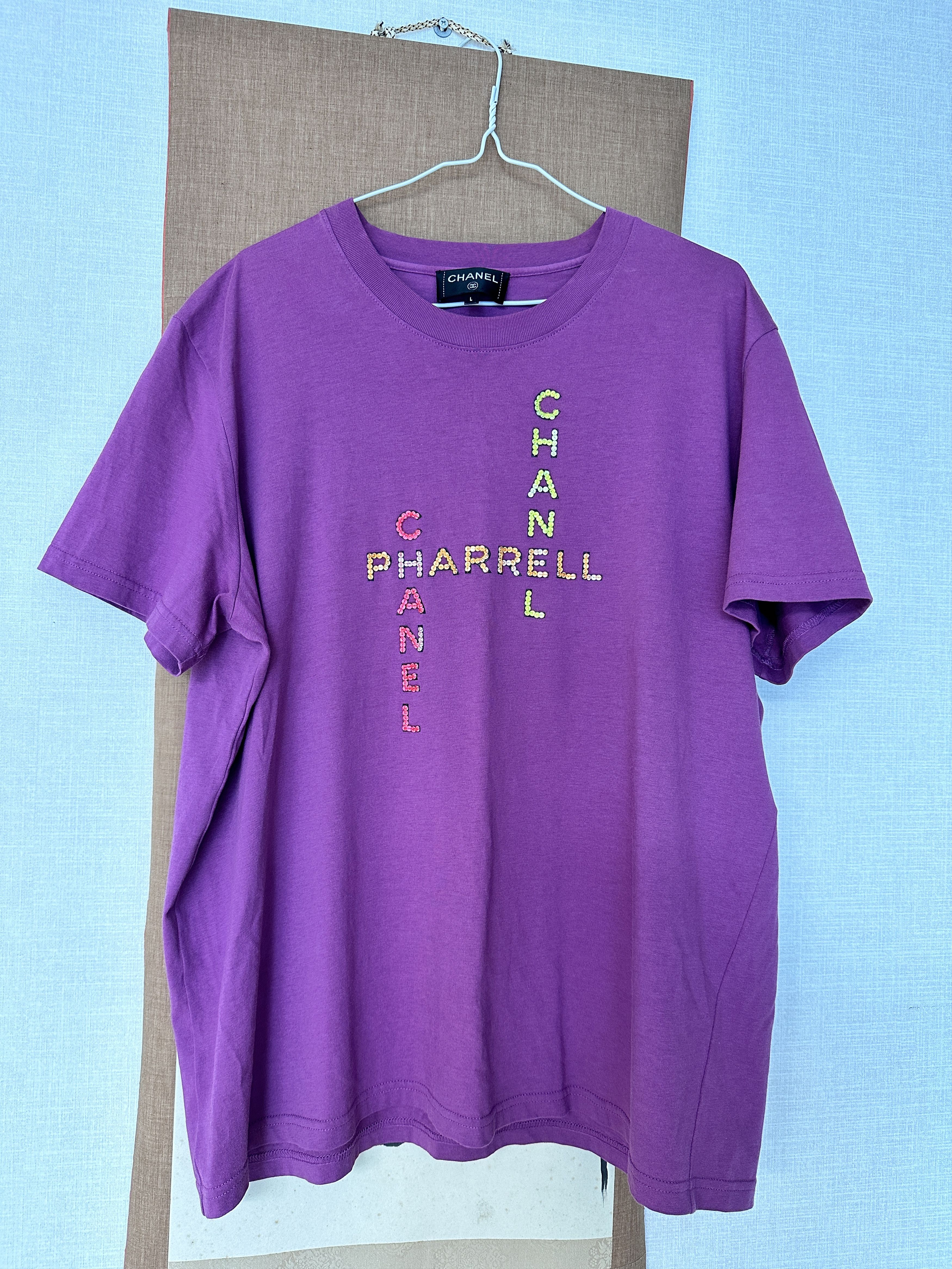 Chanel x hot sale pharrell shirt