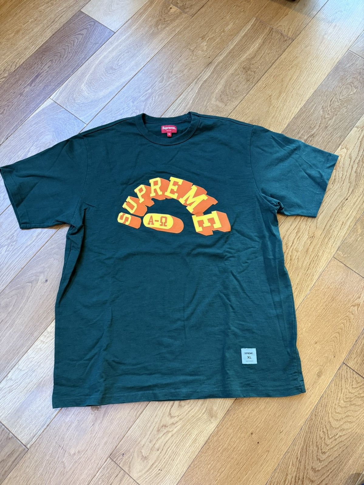 Supreme Alpha Omega S/S Top