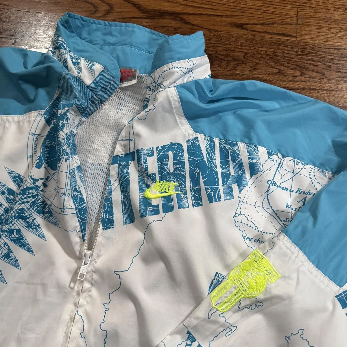 Vintage Nike International All Over Print Jacket (Size L)