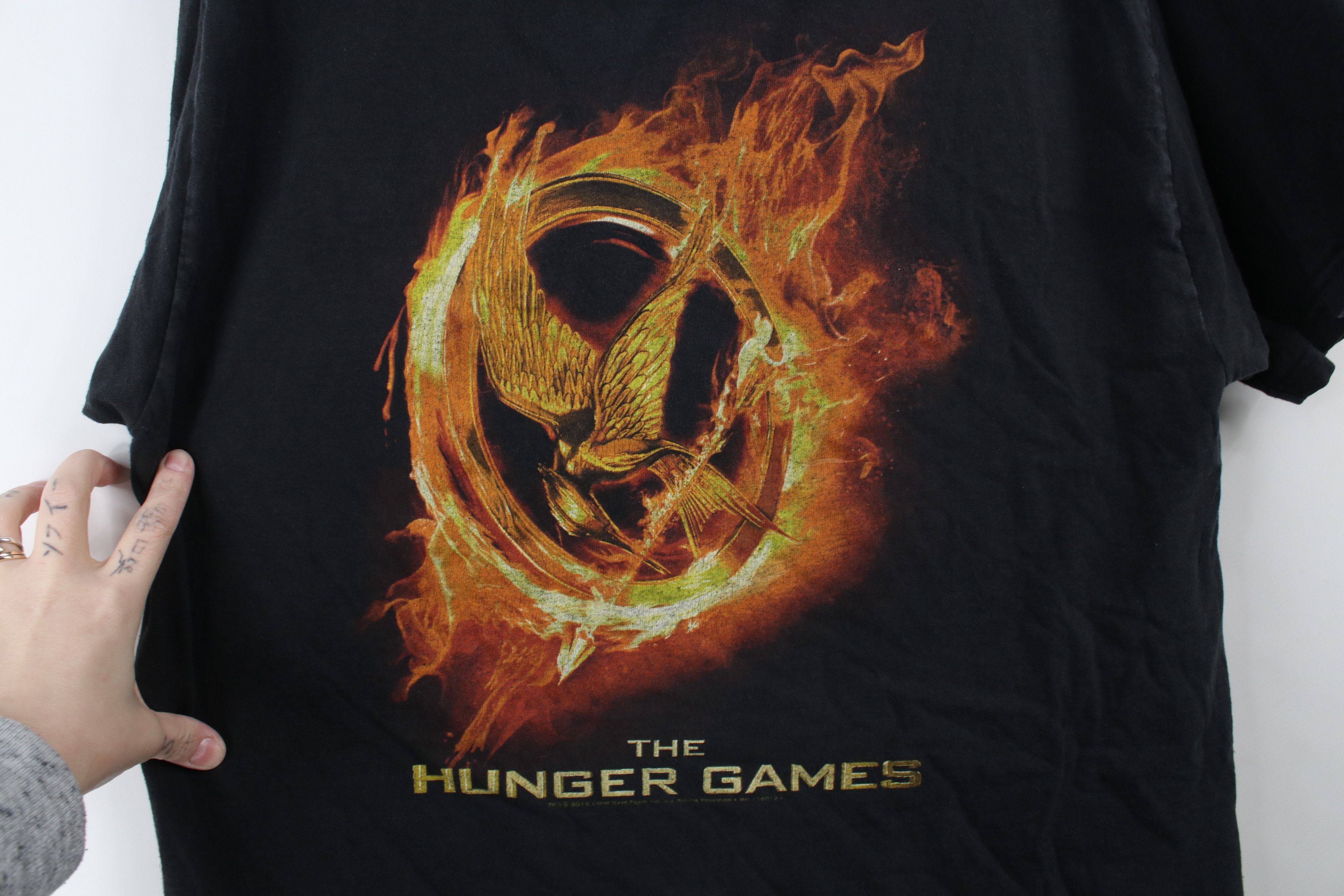 Vintage Vintage Y2K The Hunger Games Short Sleeve T-Shirt Black Size US L / EU 52-54 / 3 - 4 Thumbnail