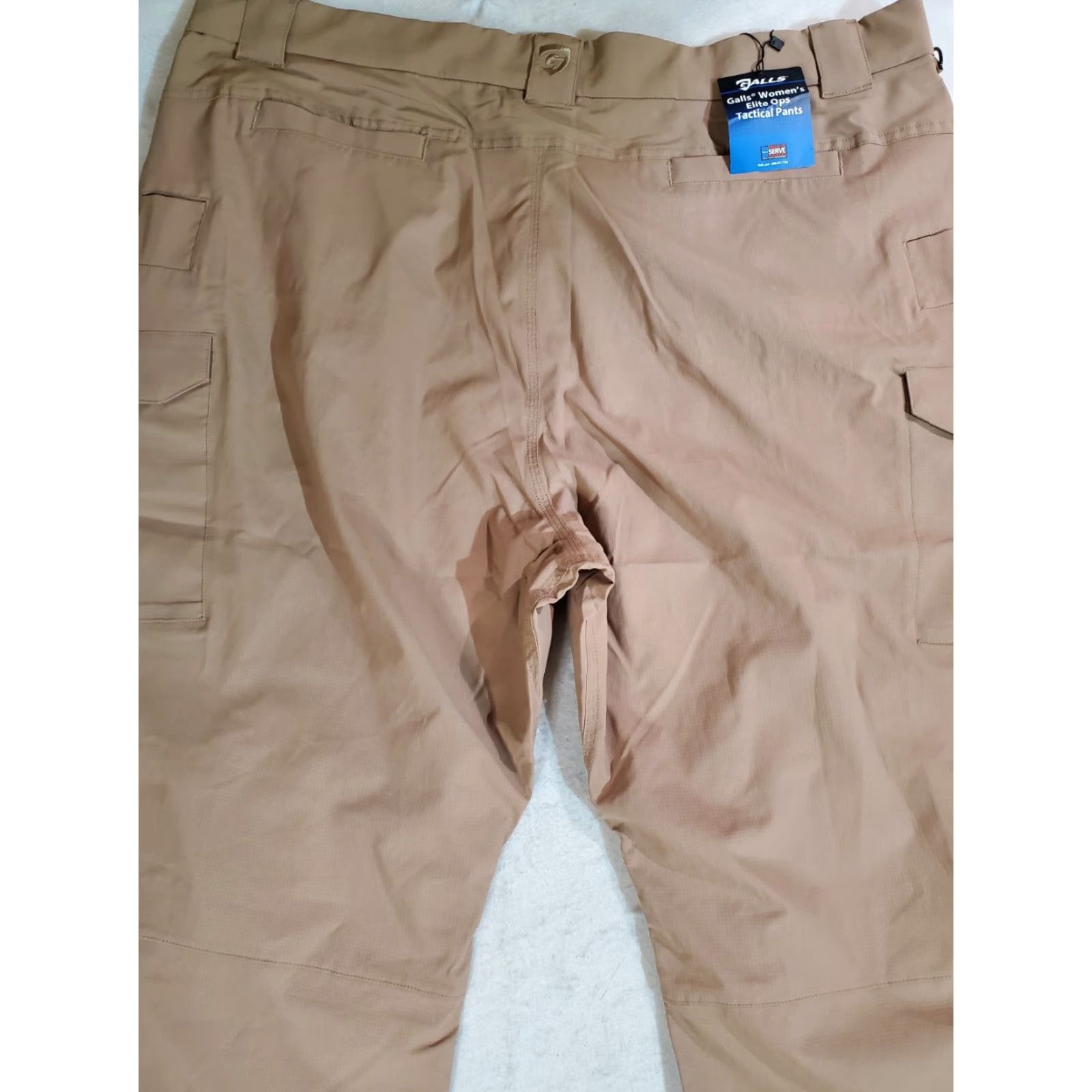 Vintage **GALLS Signature WOMENS Khaki 24x30 Elite Ops TACTICAL PANTS** User: **GALLS Signature WOMENS Khaki Elite Ops TACTICAL PANTS 24x30** Size 42" / US 20 - 7 Thumbnail