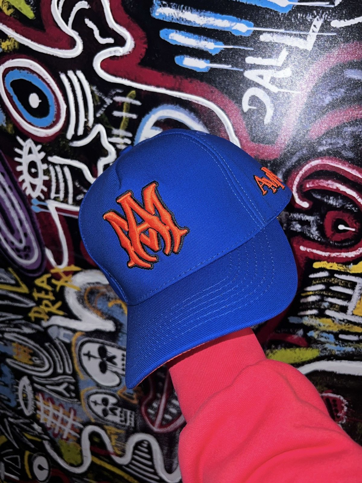image of Amiri Logo Trucker Hat in Blue, Men's
