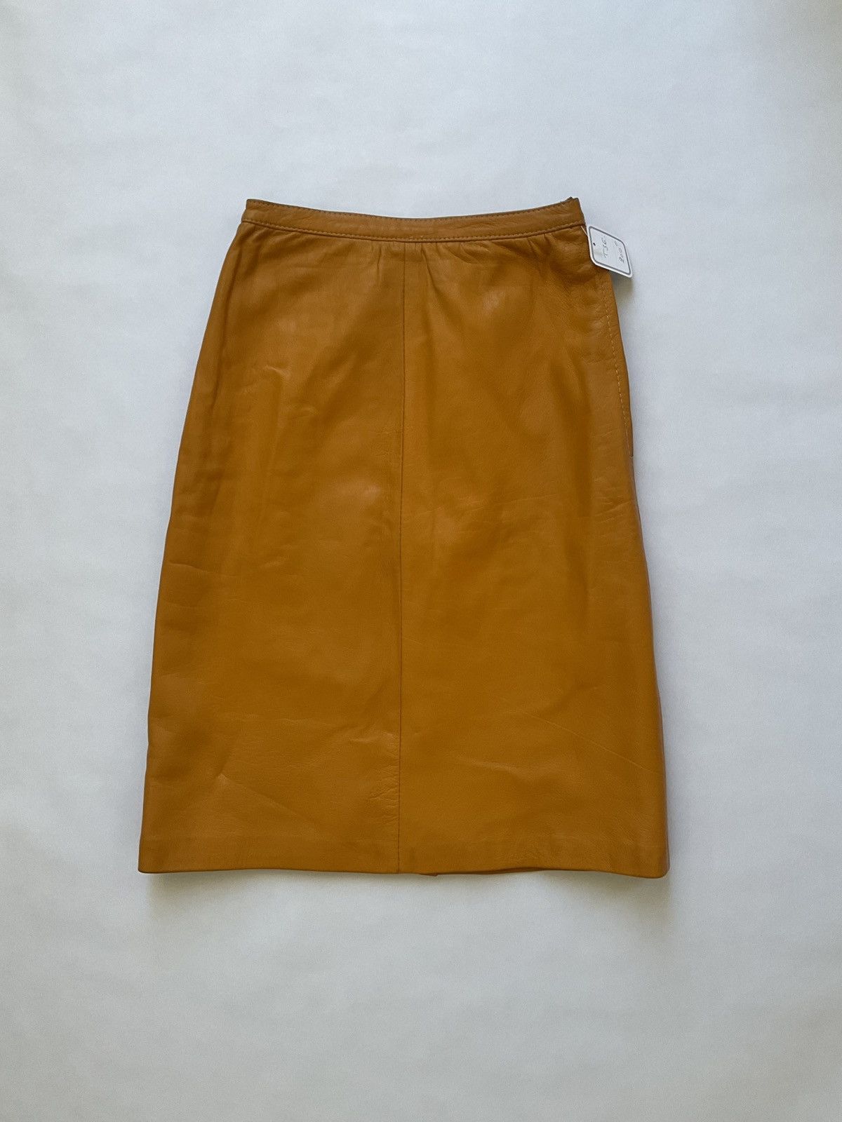 Vintage Vintage yellow leather midi skirt Size 26" / US 2 / IT 38 - 1 Thumbnail