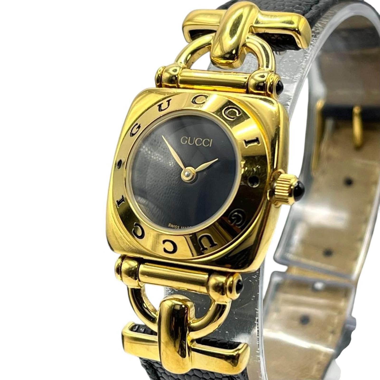 Gucci Gucci - Women's Gold Tone and Black Leather Wristwatch Size ONE SIZE - 1 Thumbnail