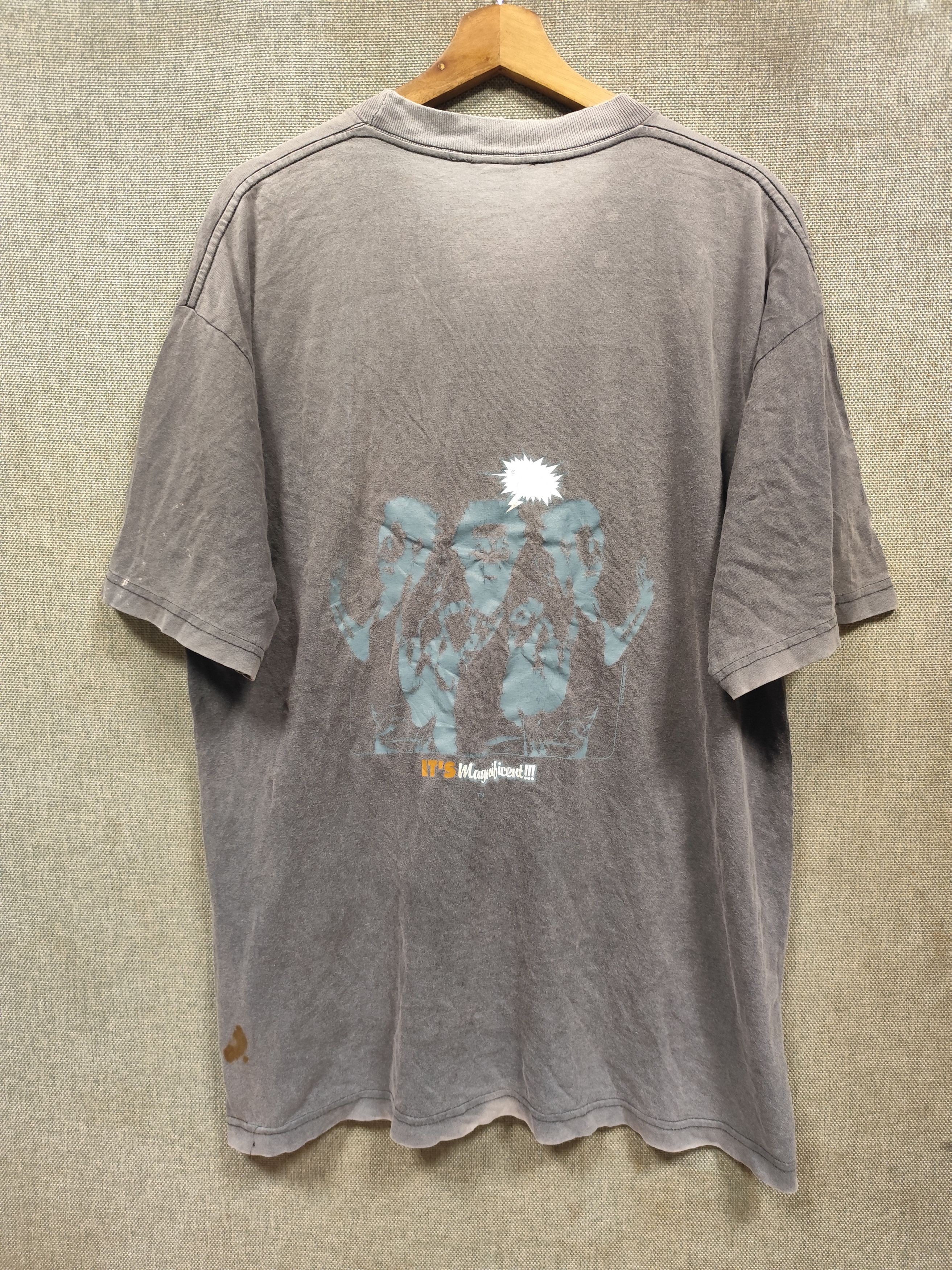 vintage 90s t shirt its magnificent distressed sunfaded
