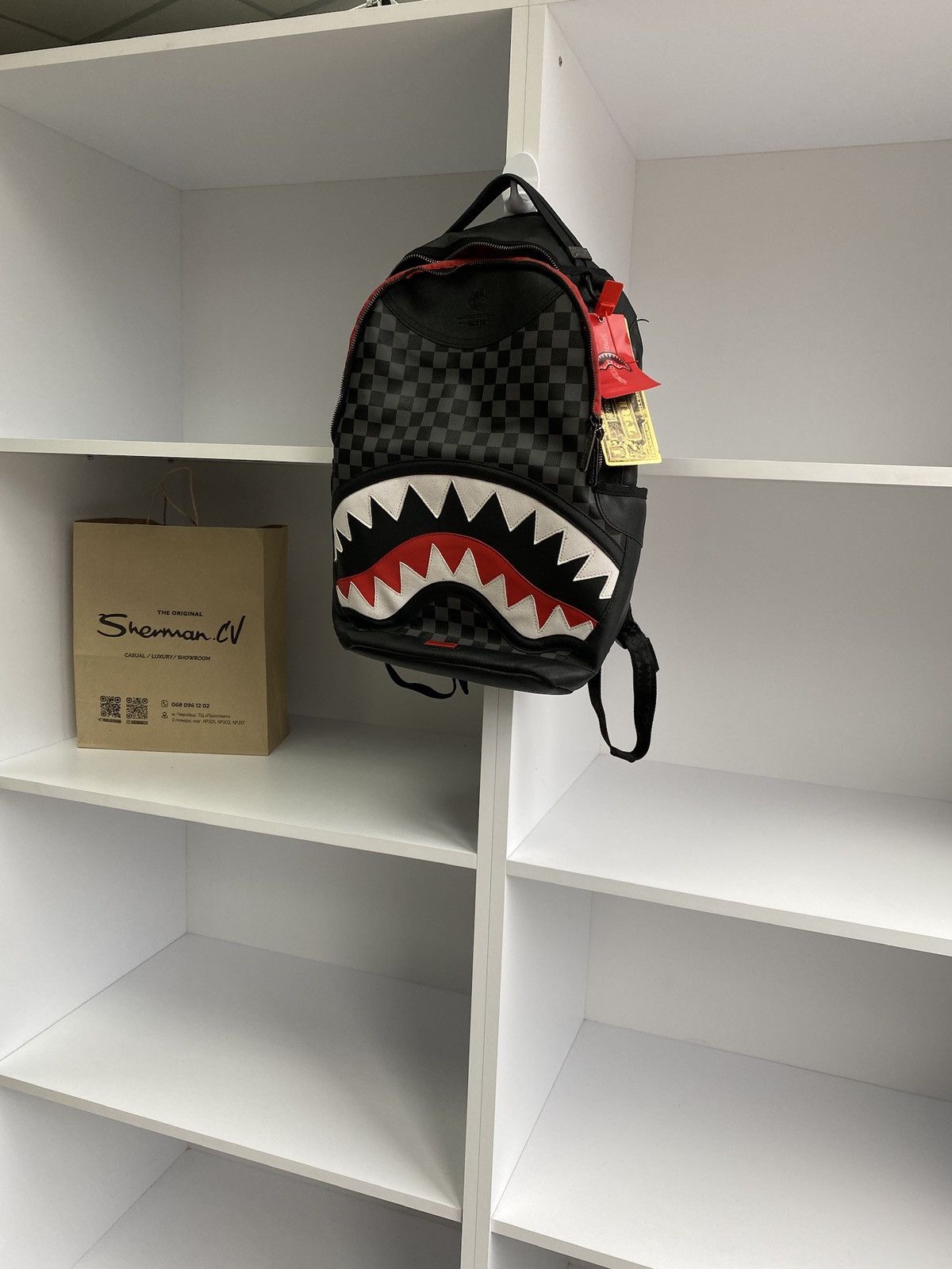 Sprayground damage control backpack hotsell