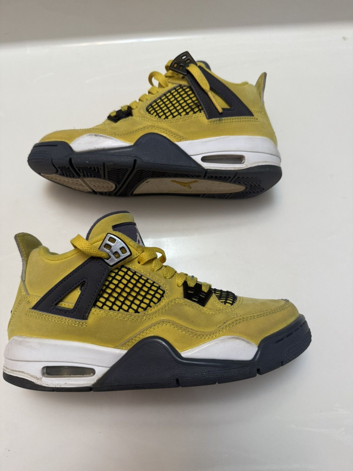 Jordan Brand Lightning Jordan 4s Size US 4.5 / IT 34.5 - 1 Thumbnail
