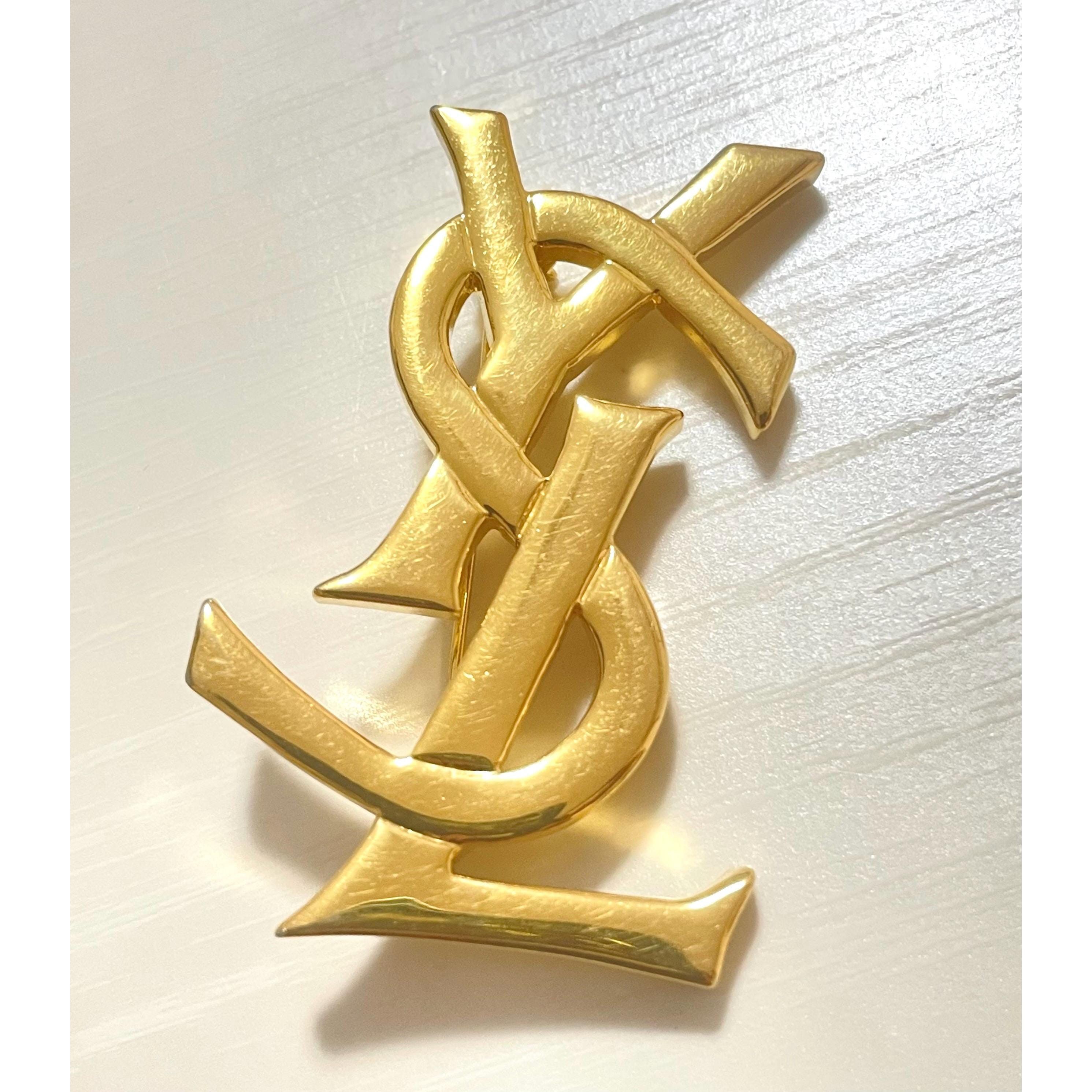 Yves Saint Laurent Vintage Yves Saint Laurent golden YSL logo brooch. Size ONE SIZE - 1 Thumbnail
