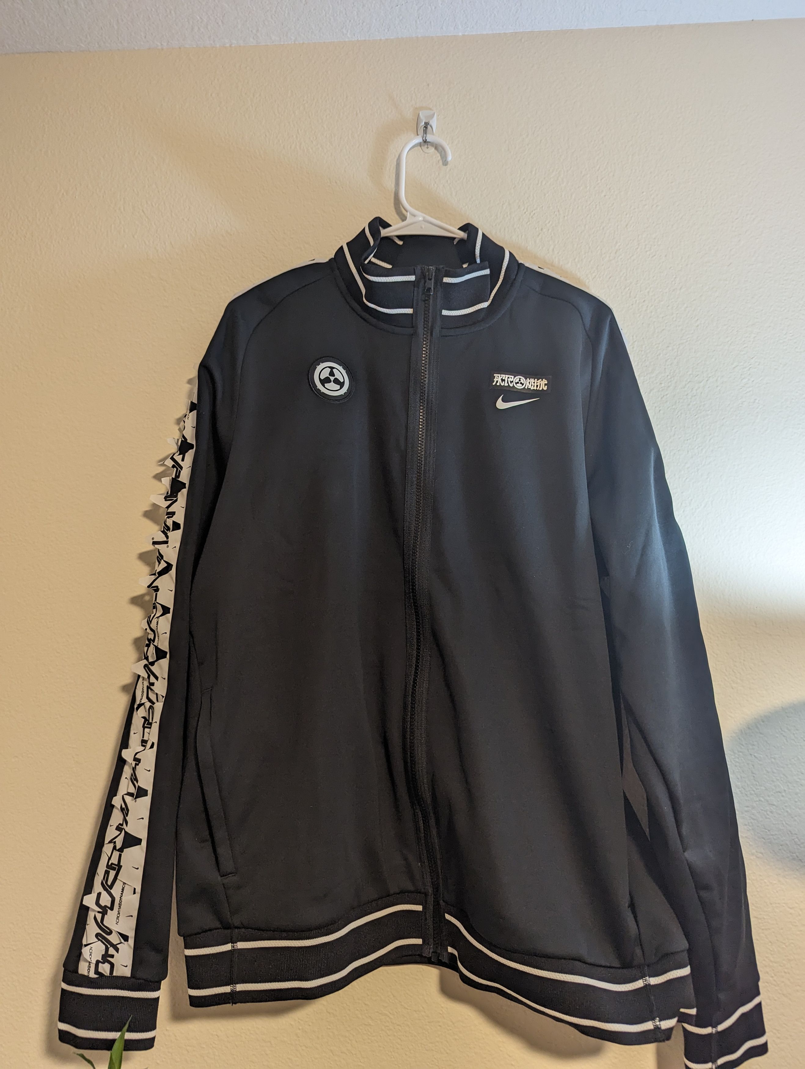 Nike swoosh taped track jacket hotsell