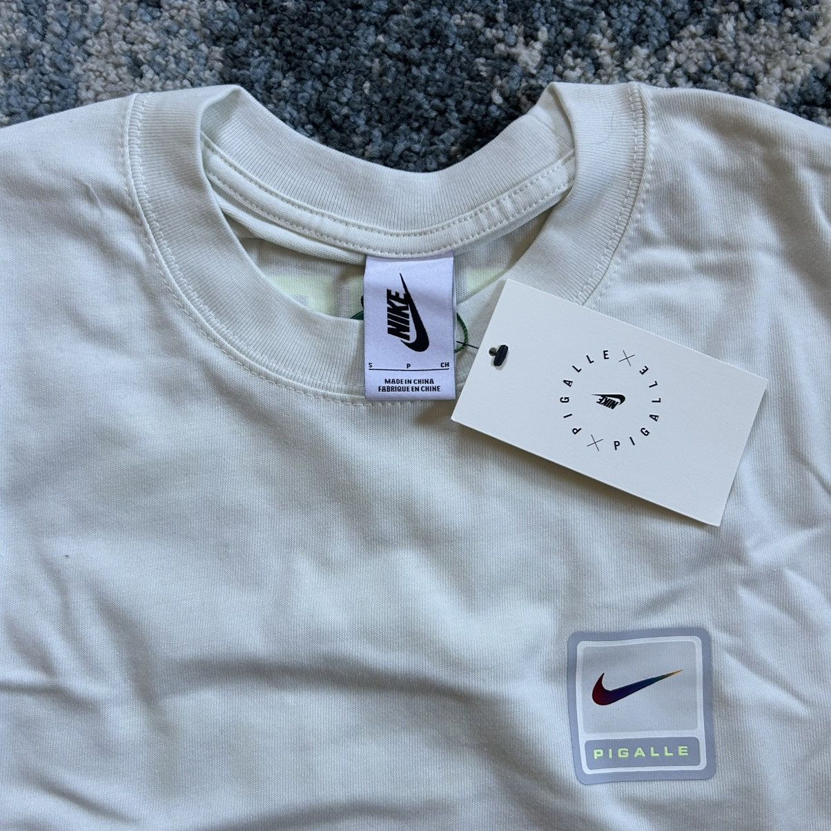 Nike × Pigalle 2019 THE POWER OF SPORT TO MOVE THE WORLD TEE SUMMiT WHiTE Size US S / EU 44-46 / 1 - 14 Thumbnail