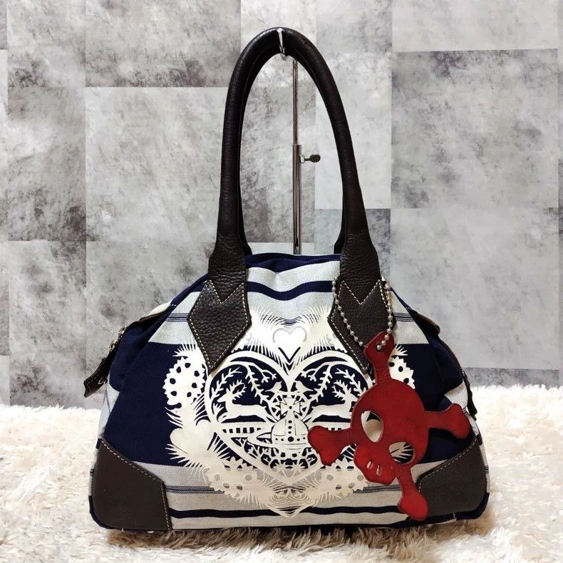 Vivienne Westwood size os Handbag skeleton pendant