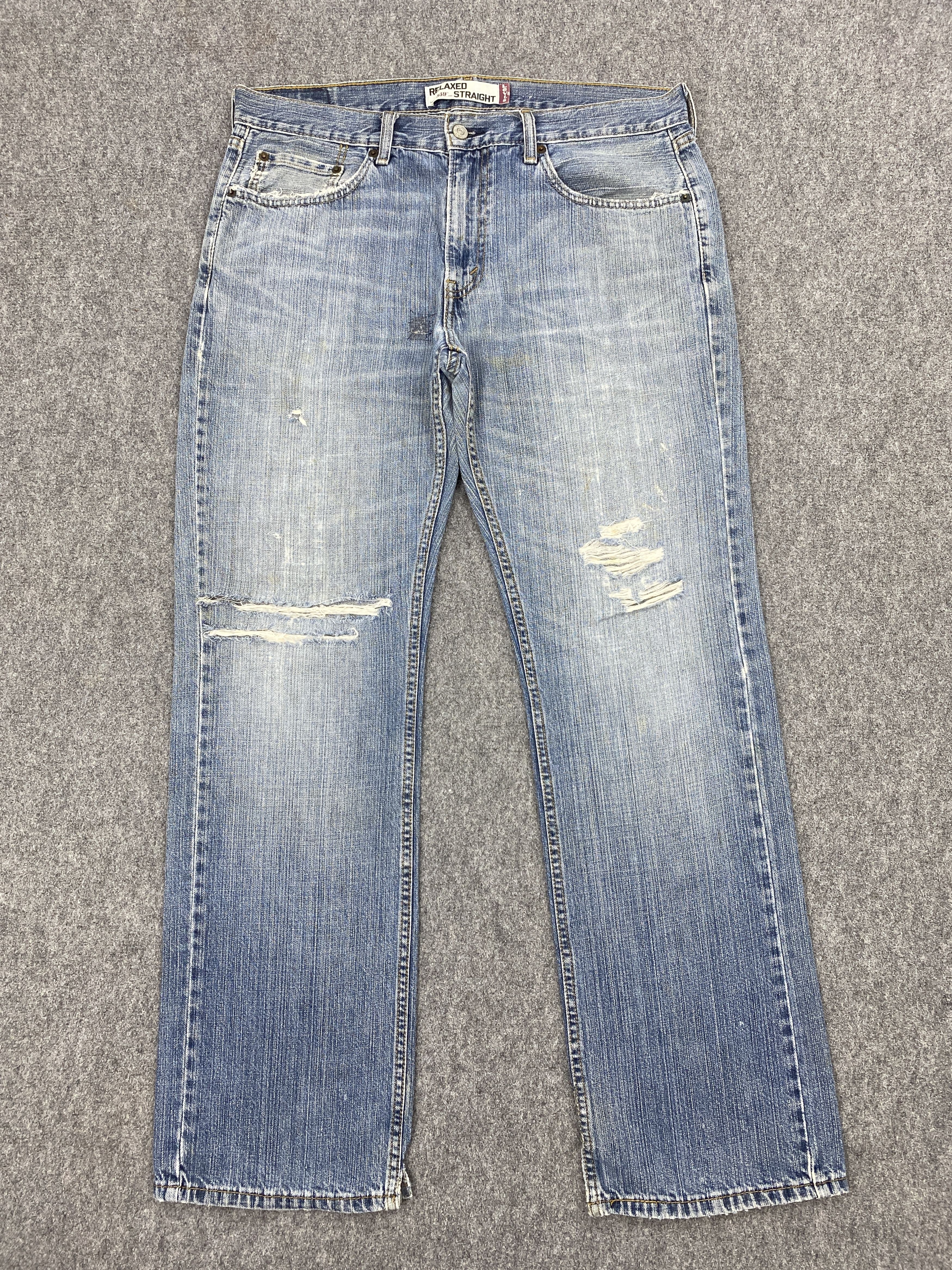 image of Distressed Vintage Levis 559 Light Washed Jeans in Blue Denim, Men's (Size 35)