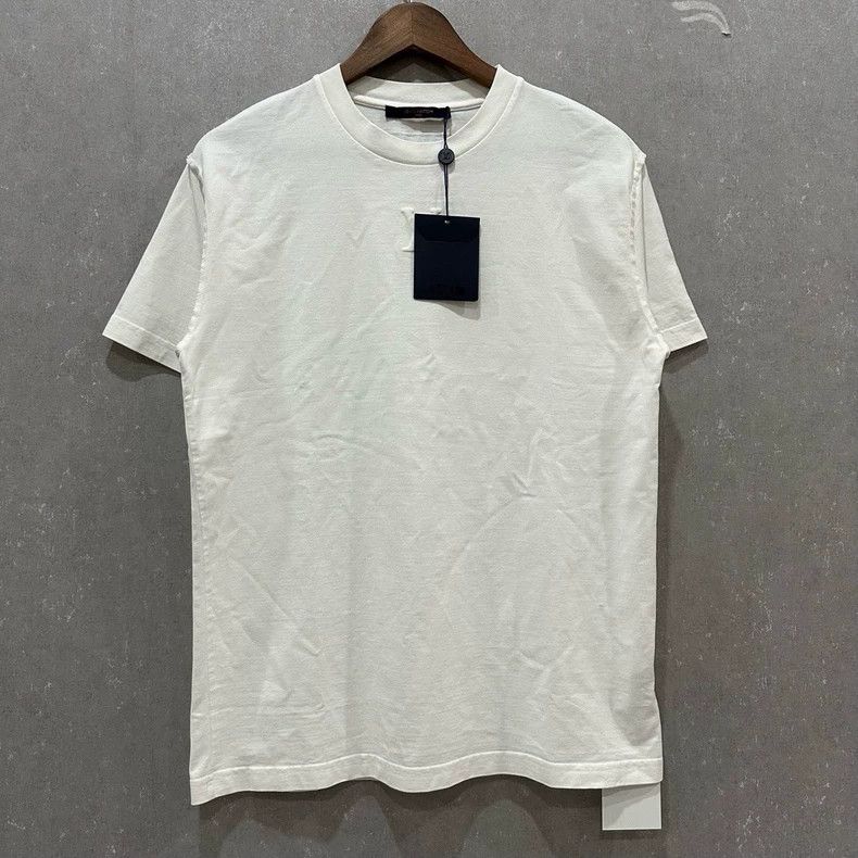 Louis Vuitton Louis Vuitton White embossed logo short sleeve Size US S / EU 44-46 / 1 - 1 Thumbnail