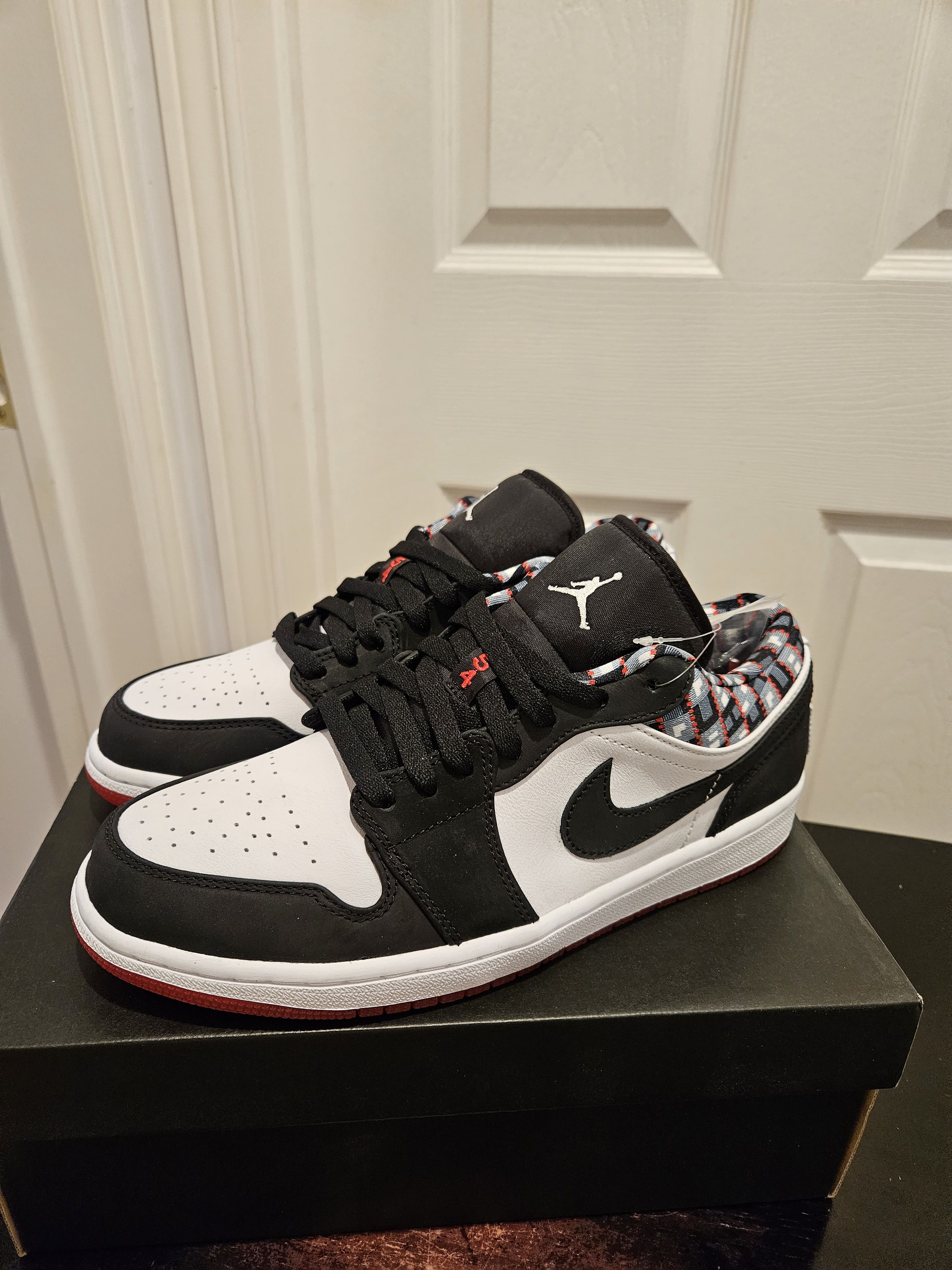 image of Air Jordan 1 Low Quai 54 (2021) Shoes in Black/White/Red, Men's (Size 9)