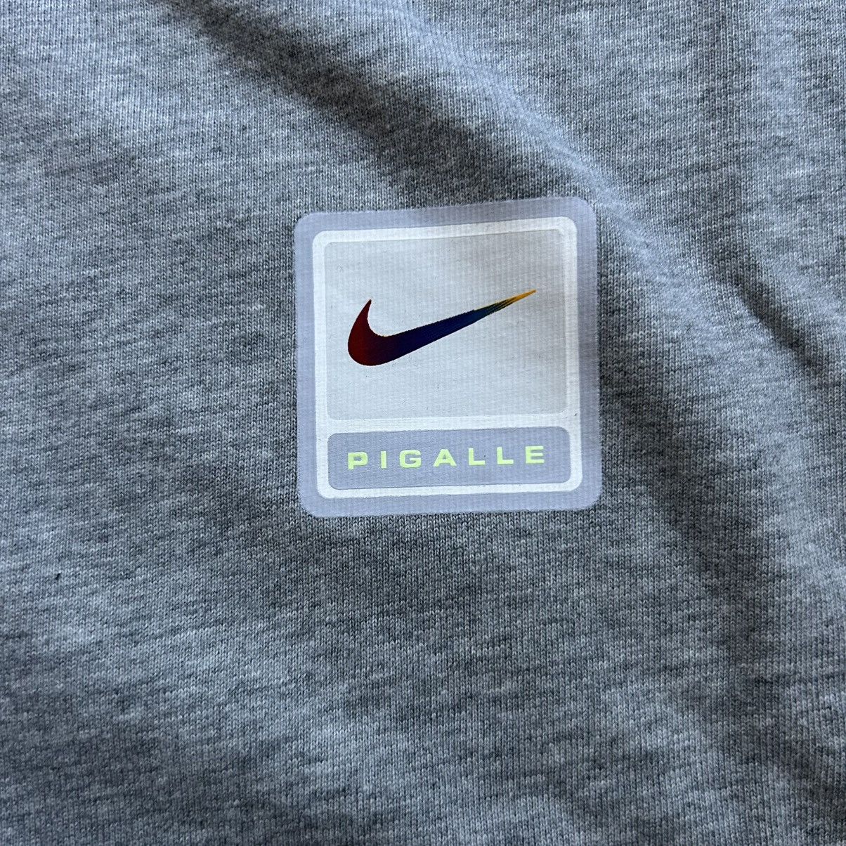 Nike × Pigalle 2019 THE POWER OF SPORT TO MOVE THE WORLD TEE HEATHER SAiL Size US M / EU 48-50 / 2 - 6 Thumbnail