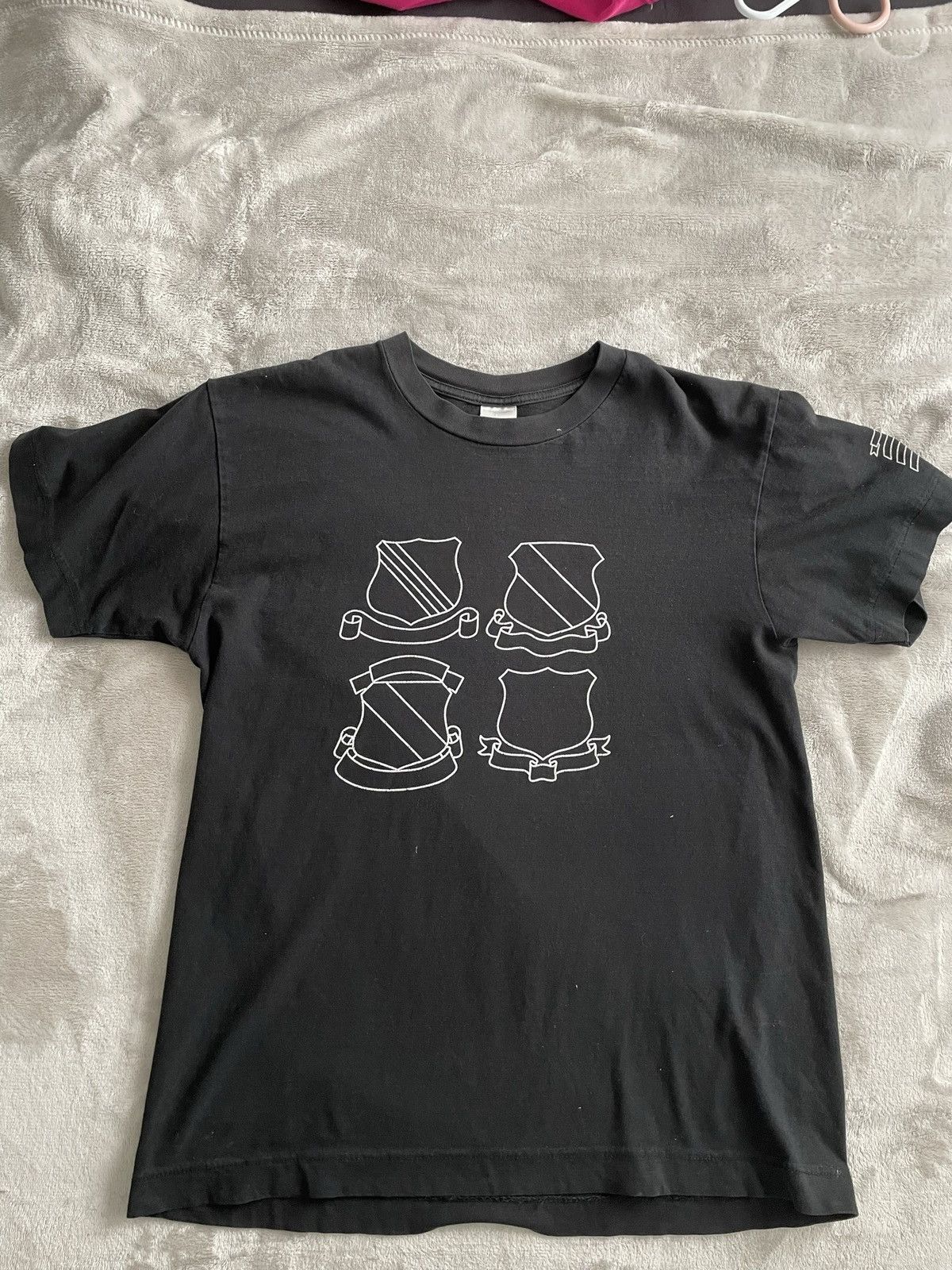 image of Number N Ine x Takahiromiyashita The Soloist Number (N)Ine Shield Emblem Tee in Black (Size Medium)