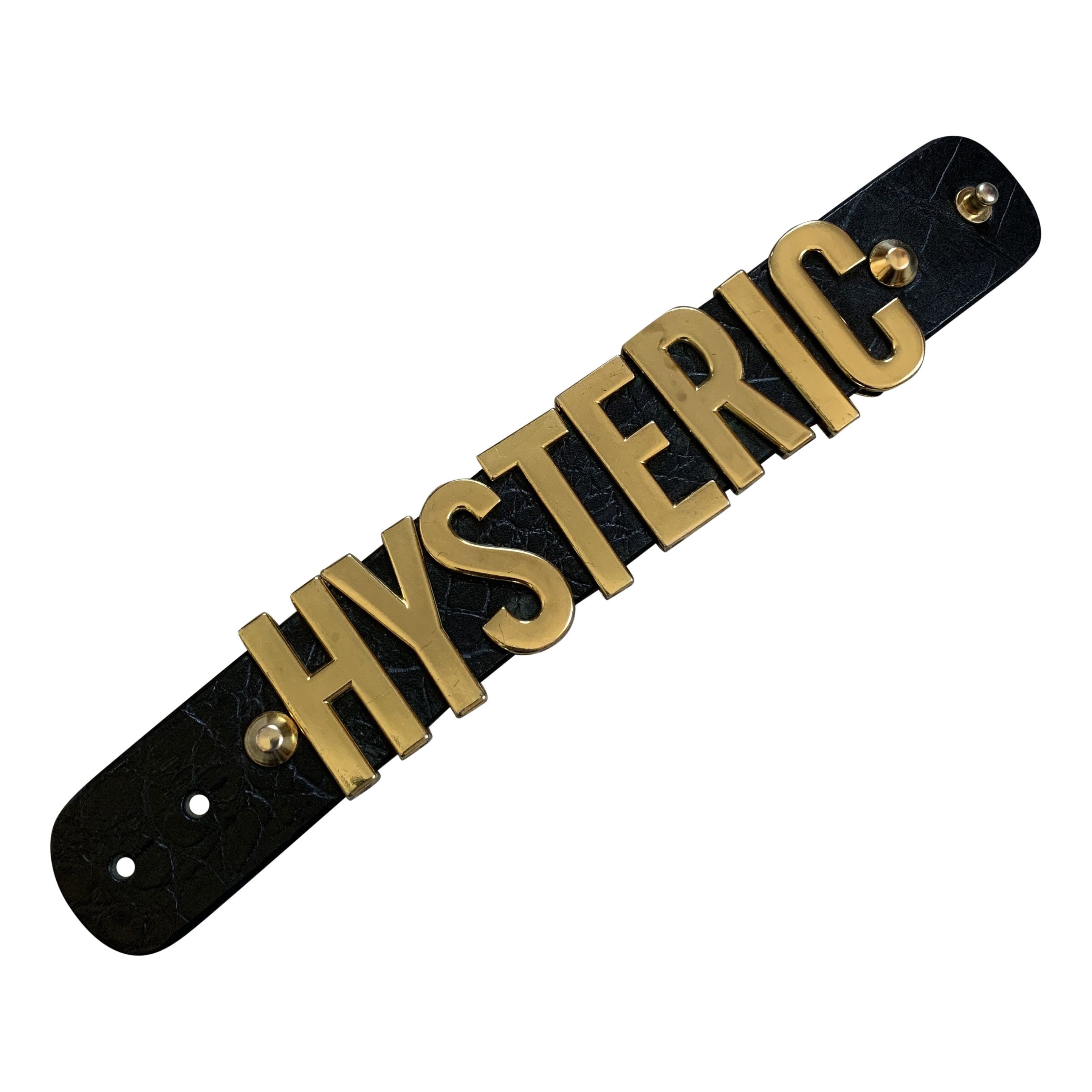 image of Hysteric Glamour Spellout Logo Leather Bracelet in Black/Gold, Men's
