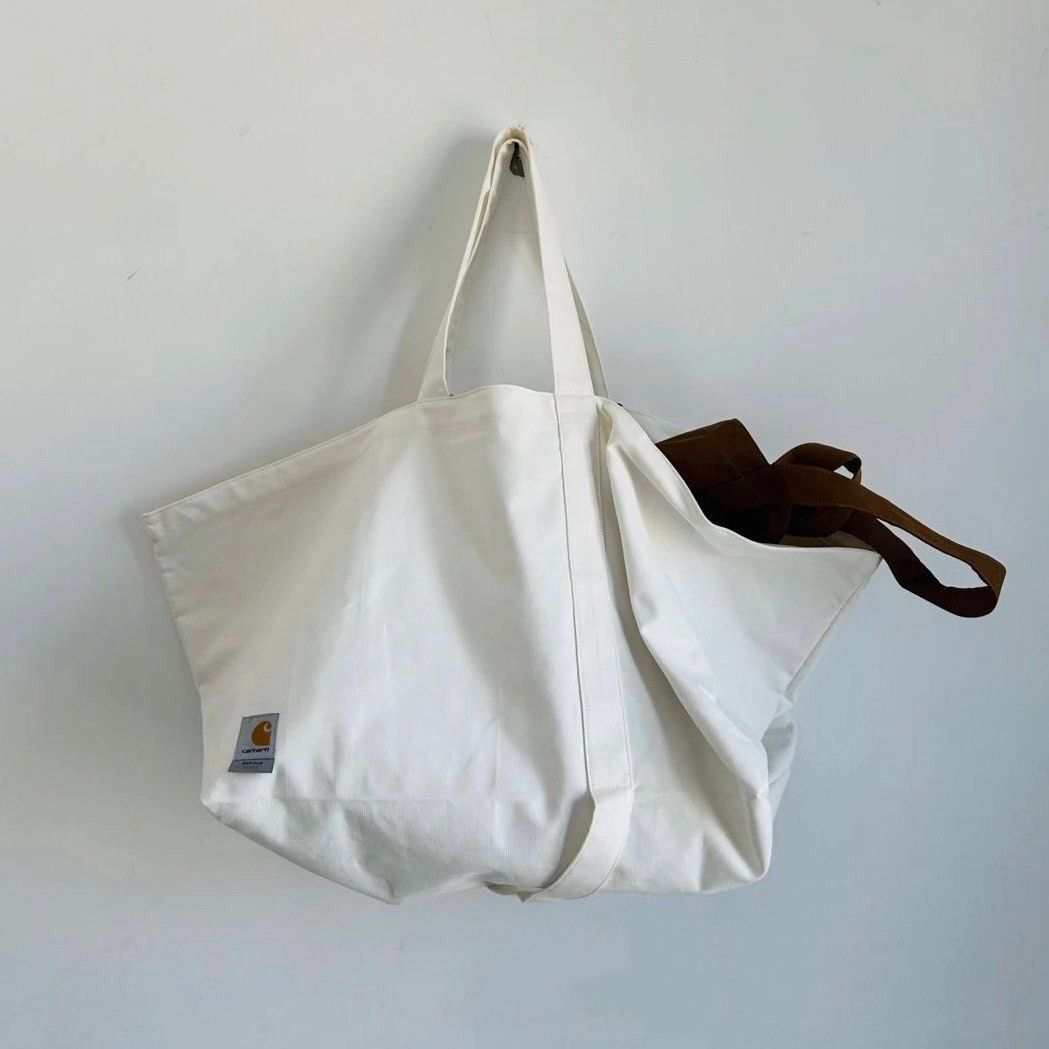Carhartt Carhartt WIP x RAMIDUS Tote Bag XL – White Size ONE SIZE - 1 Thumbnail