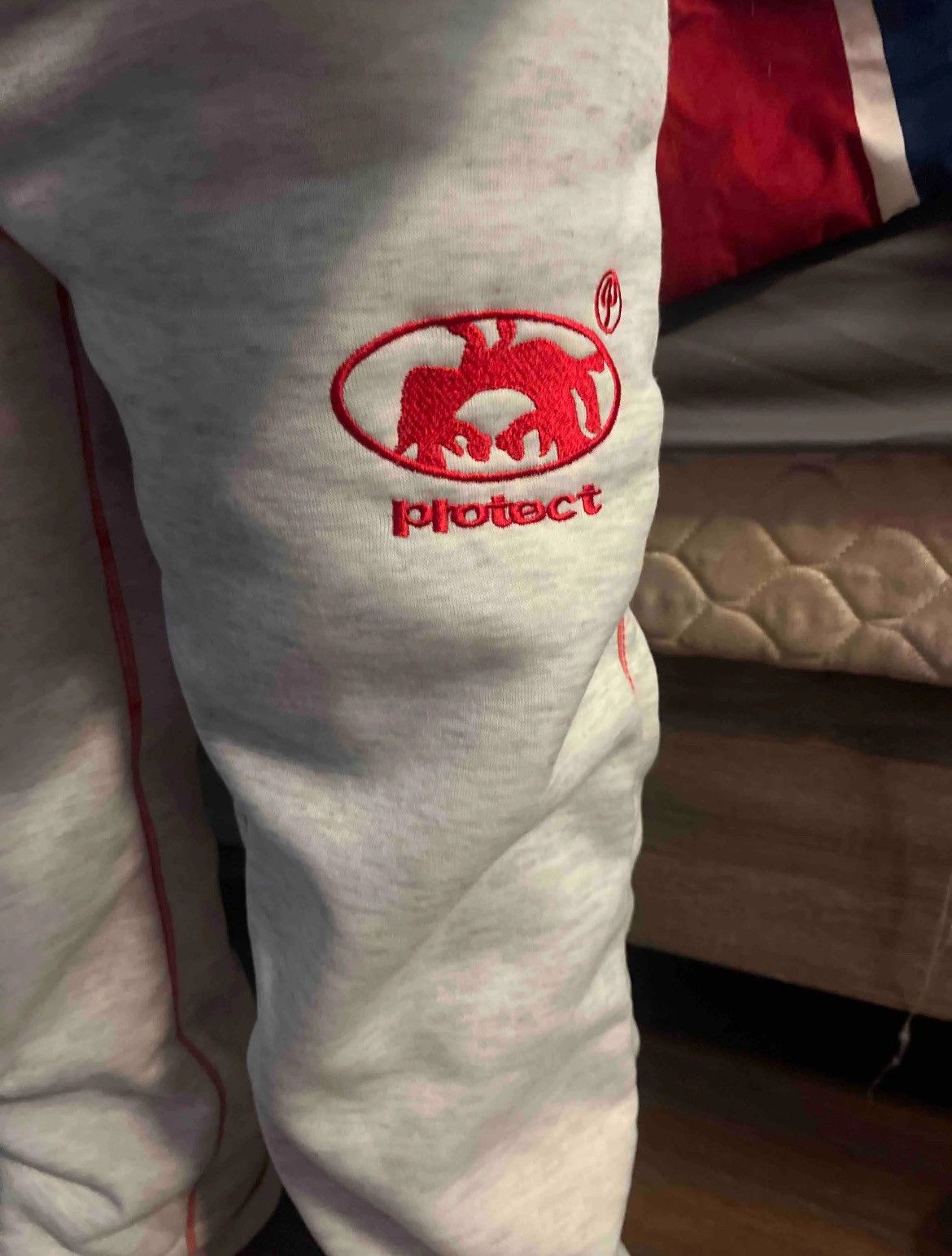 Protect White and Red sweatpants