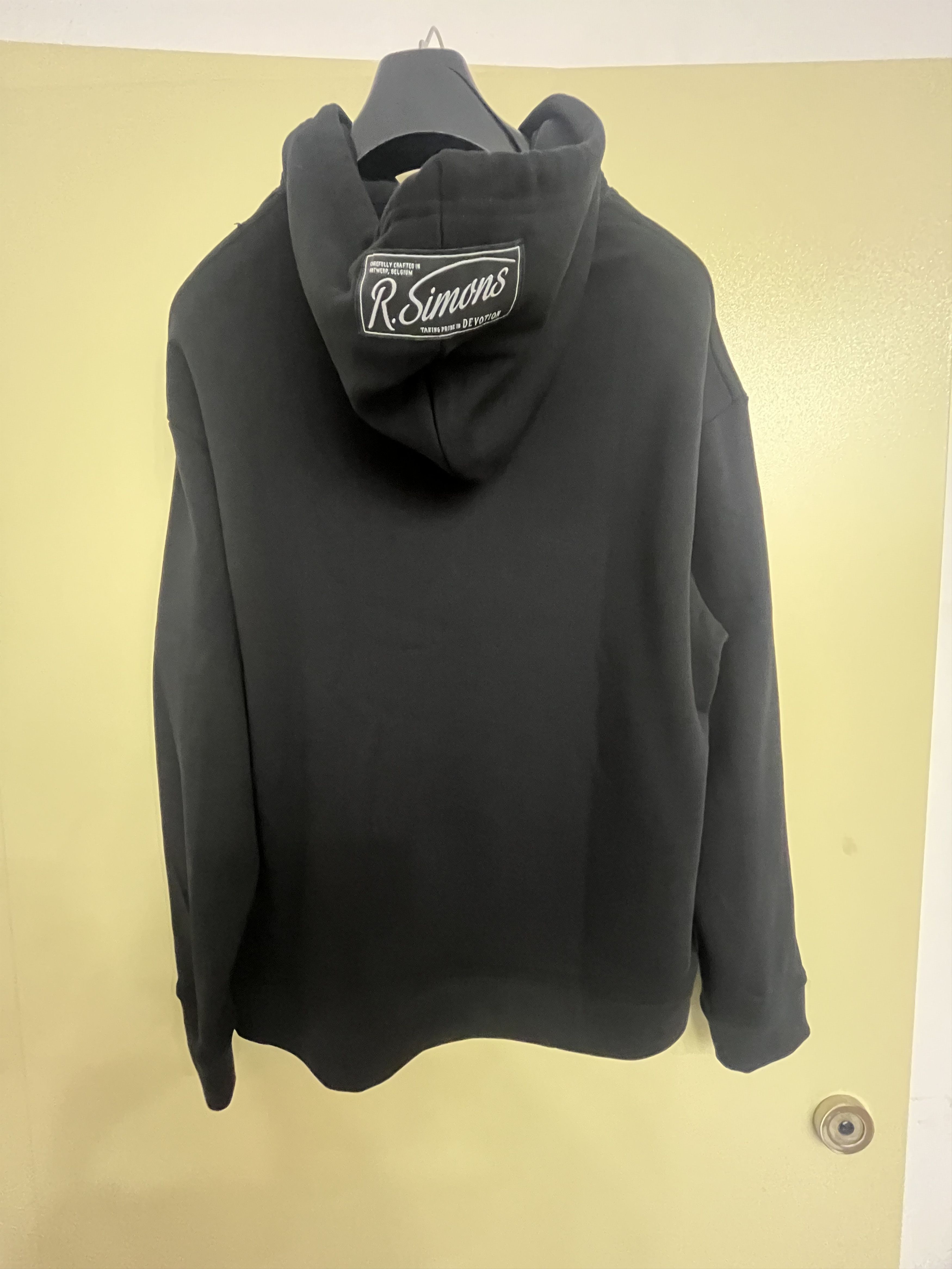 Raf Simons Raf Simons “Synchronicity” Print Hoodie – Black – Size S Size US S / EU 44-46 / 1 - 4 Thumbnail
