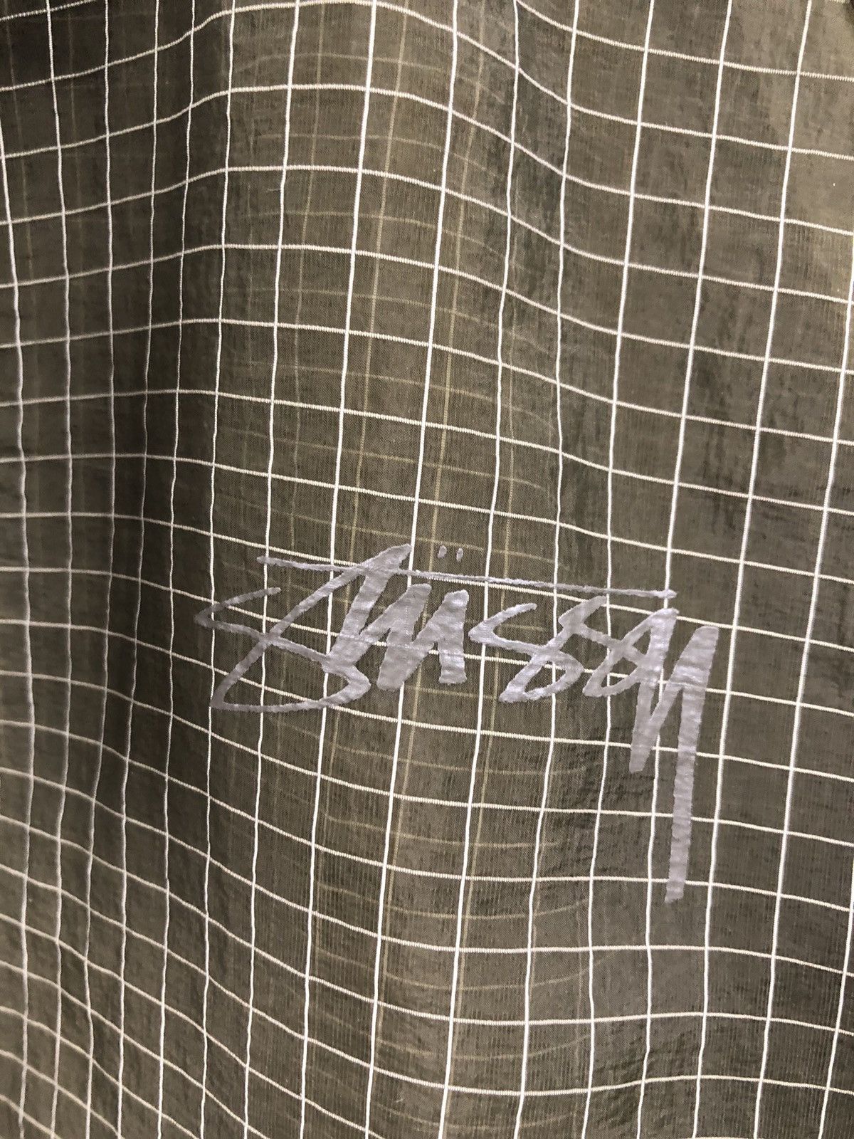 【ステューシー】Stussy Beach Shell Transparent Ripstop Olive 【ステューシー】Stussy Olive Beach Transparent Shell Ripstop