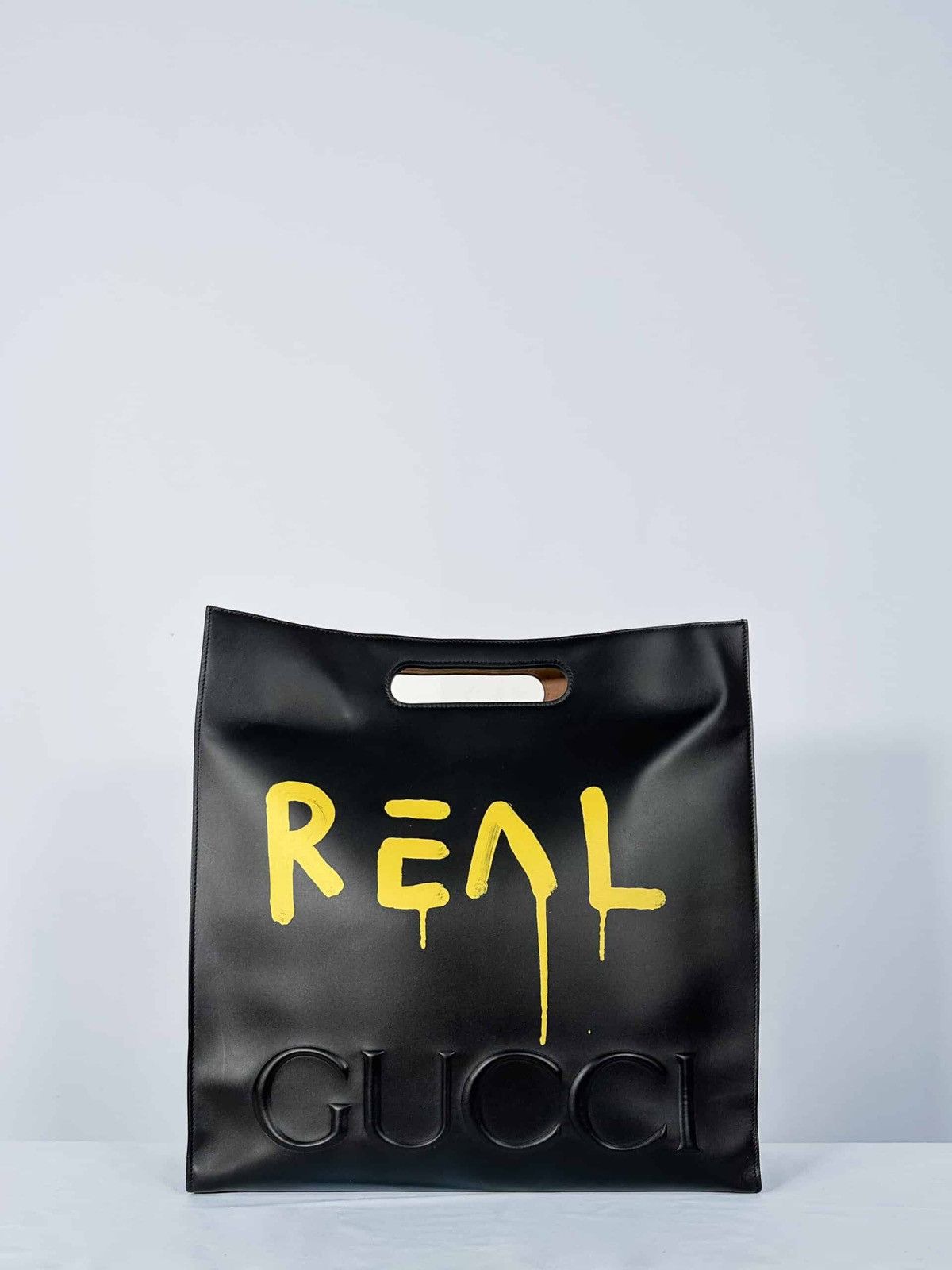 image of Gucci Ghost Bag Logo Yellow All-Over Logo in Black, Men's