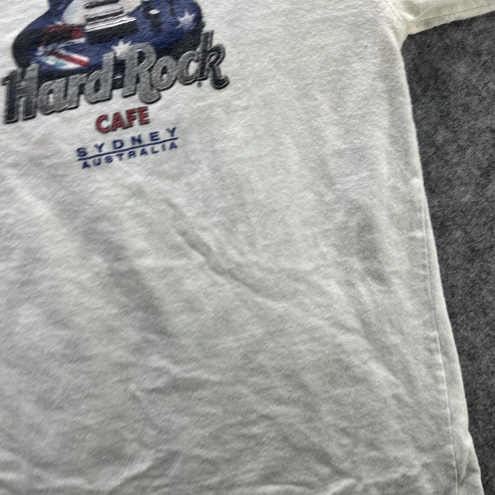 Hard Rock Cafe VINTAGE Hard Rock Cafe Shirt Mens Small White Sydney Australia 90s Guitar Rock Music Graphic Print Crew Neck Short Sleeve Cotton T-Shirt Size US S / EU 44-46 / 1 - 6 Thumbnail