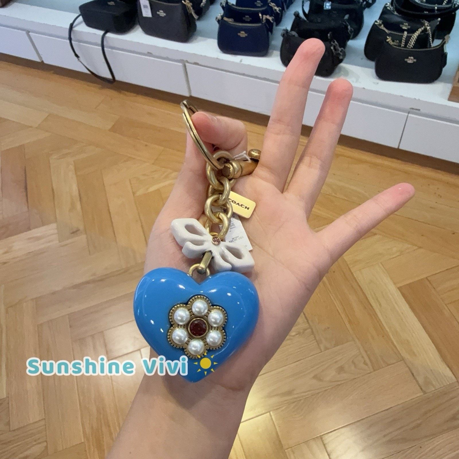 Disney NWT COACH Heart Bag Charm CBH12 Brass/Blue Multi Size ONE SIZE - 1 Thumbnail