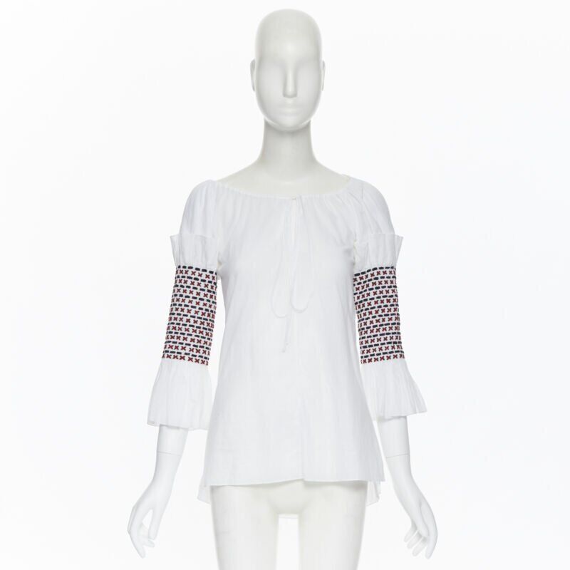Rosie Assoulin new ROSIE ASSOULIN white ethnic embroidery smocked sleeves off shoulder top US4 Size S / US 4 / IT 40 - 1 Thumbnail