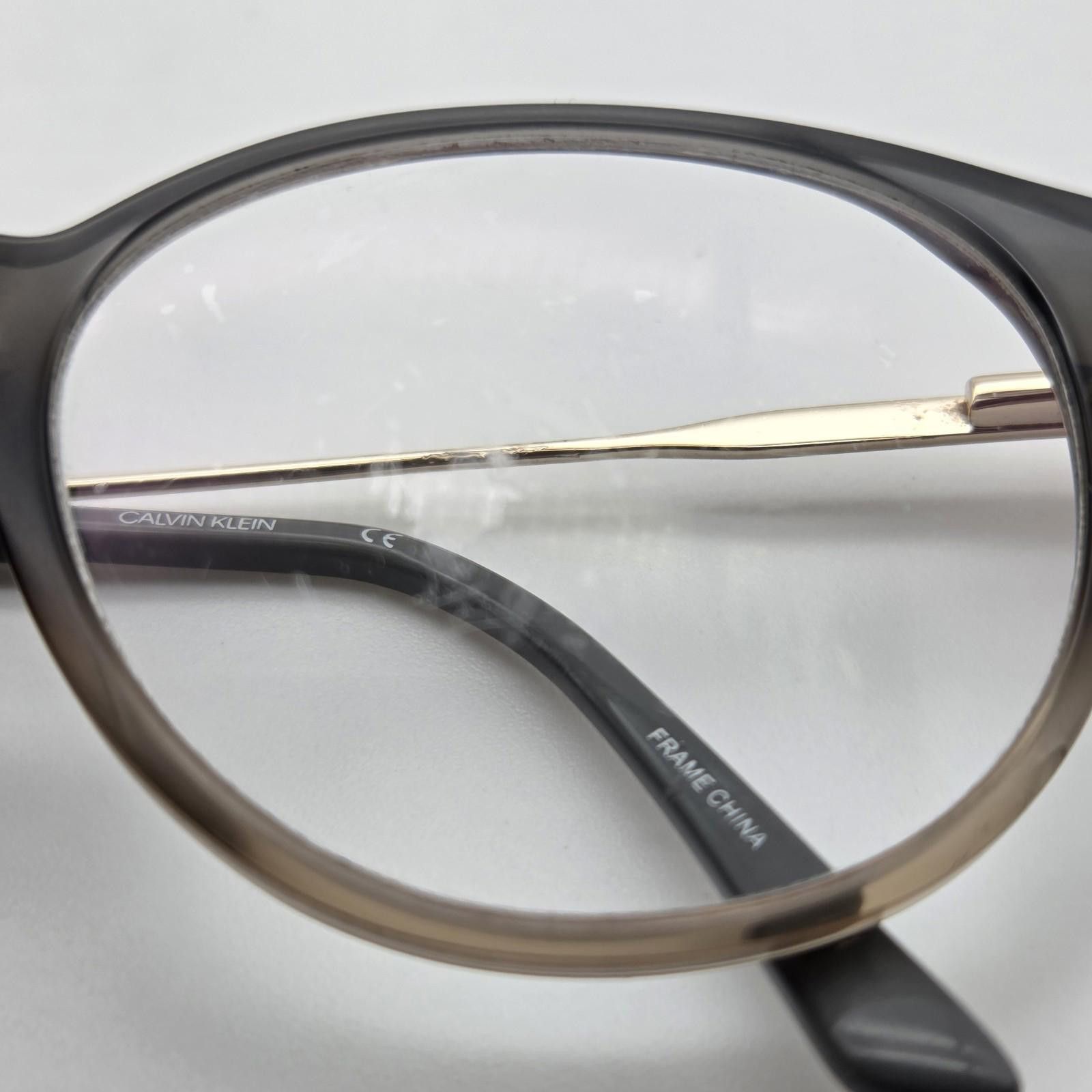 Calvin Klein Calvin Klein CK19712 Eyeglasses FRAMES ONLY 51-17-140 027 Size ONE SIZE - 12 Thumbnail
