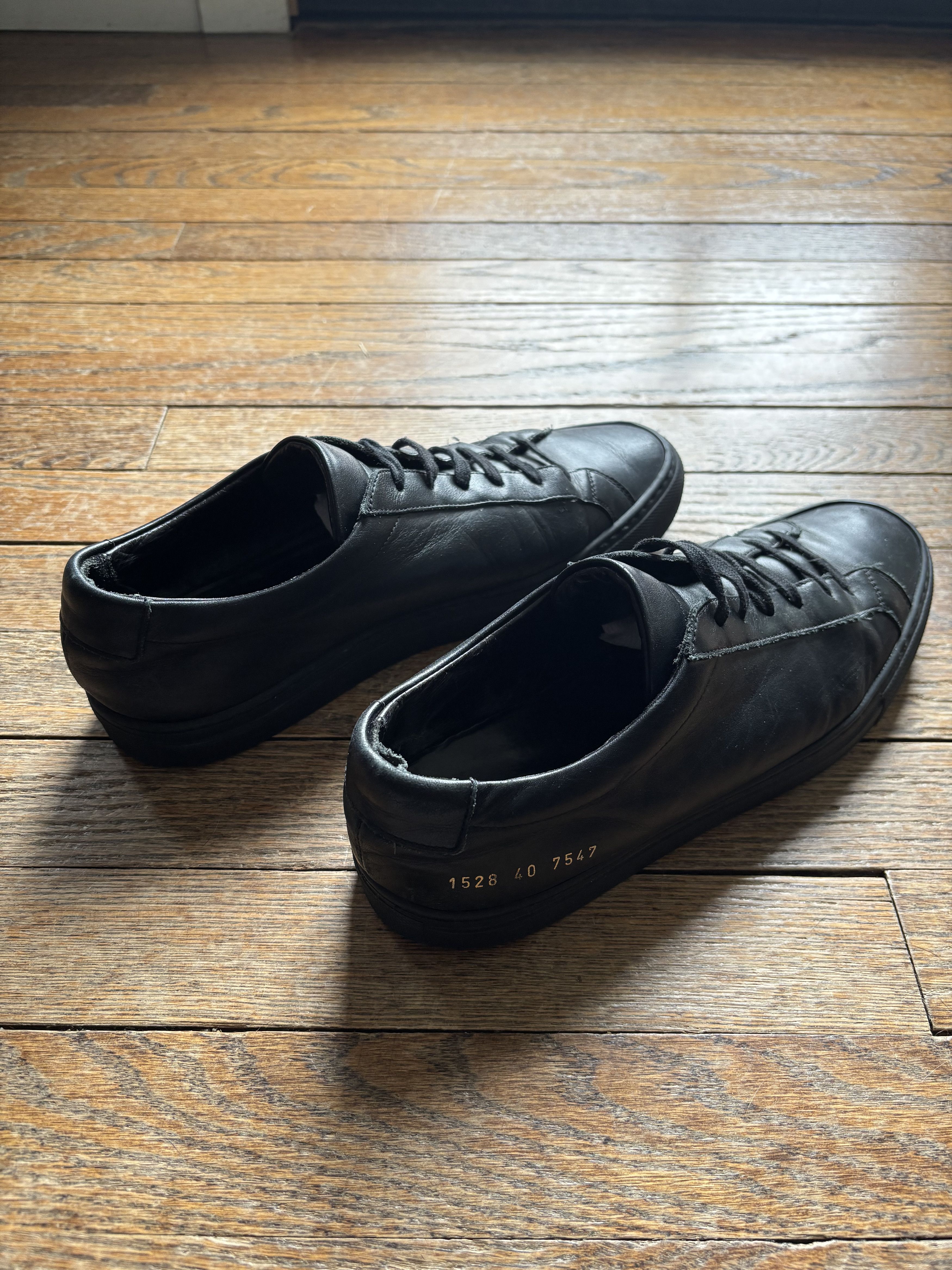 Common Projects Achilles Low - Triple Black Size US 8 / EU 41 - 1 Thumbnail