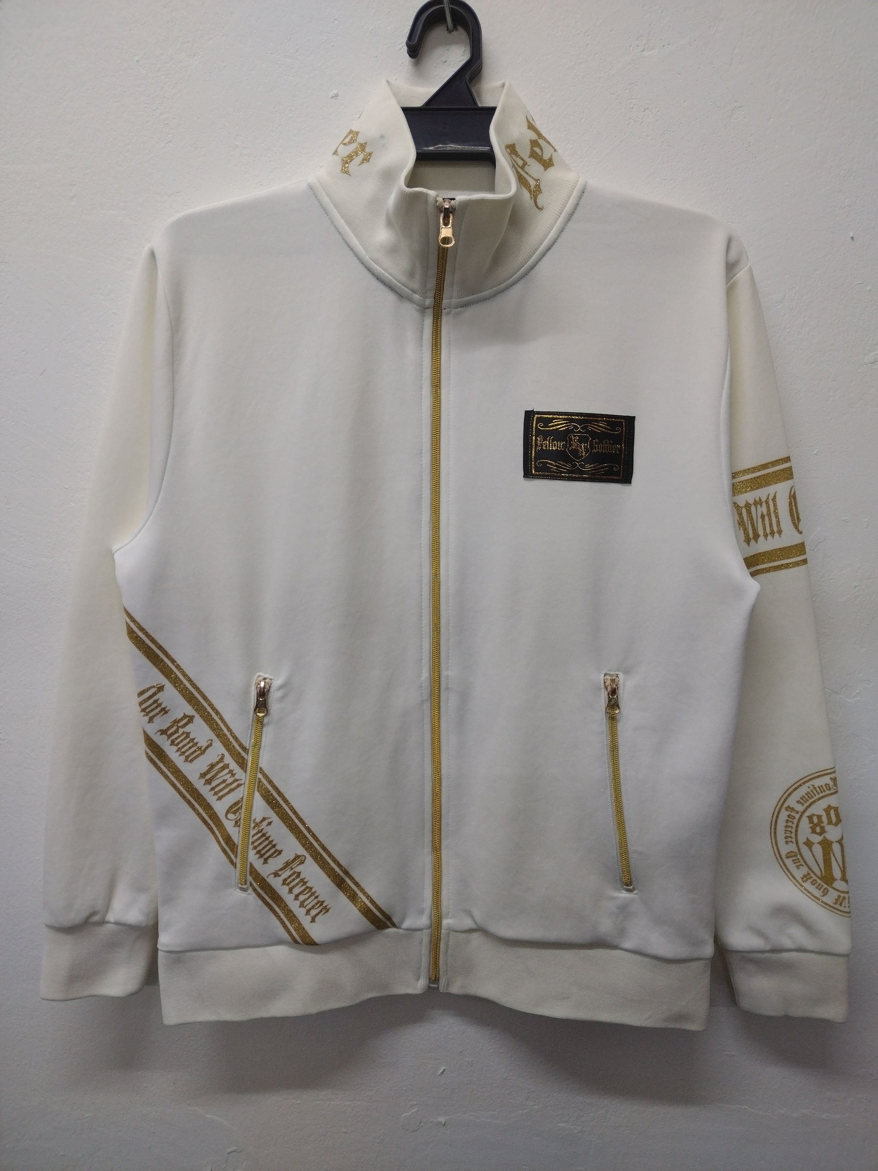 image of Military x Seditionaries Awesome Golden Thread Fellow Soldier Mighty Works Tracktop in White/Gold (