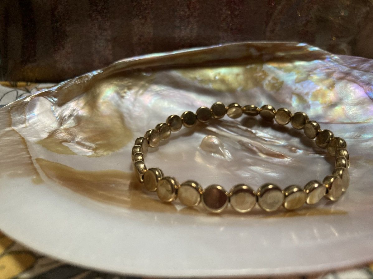 Other Gold coloured flat circular beaded bracelet Size ONE SIZE - 1 Thumbnail