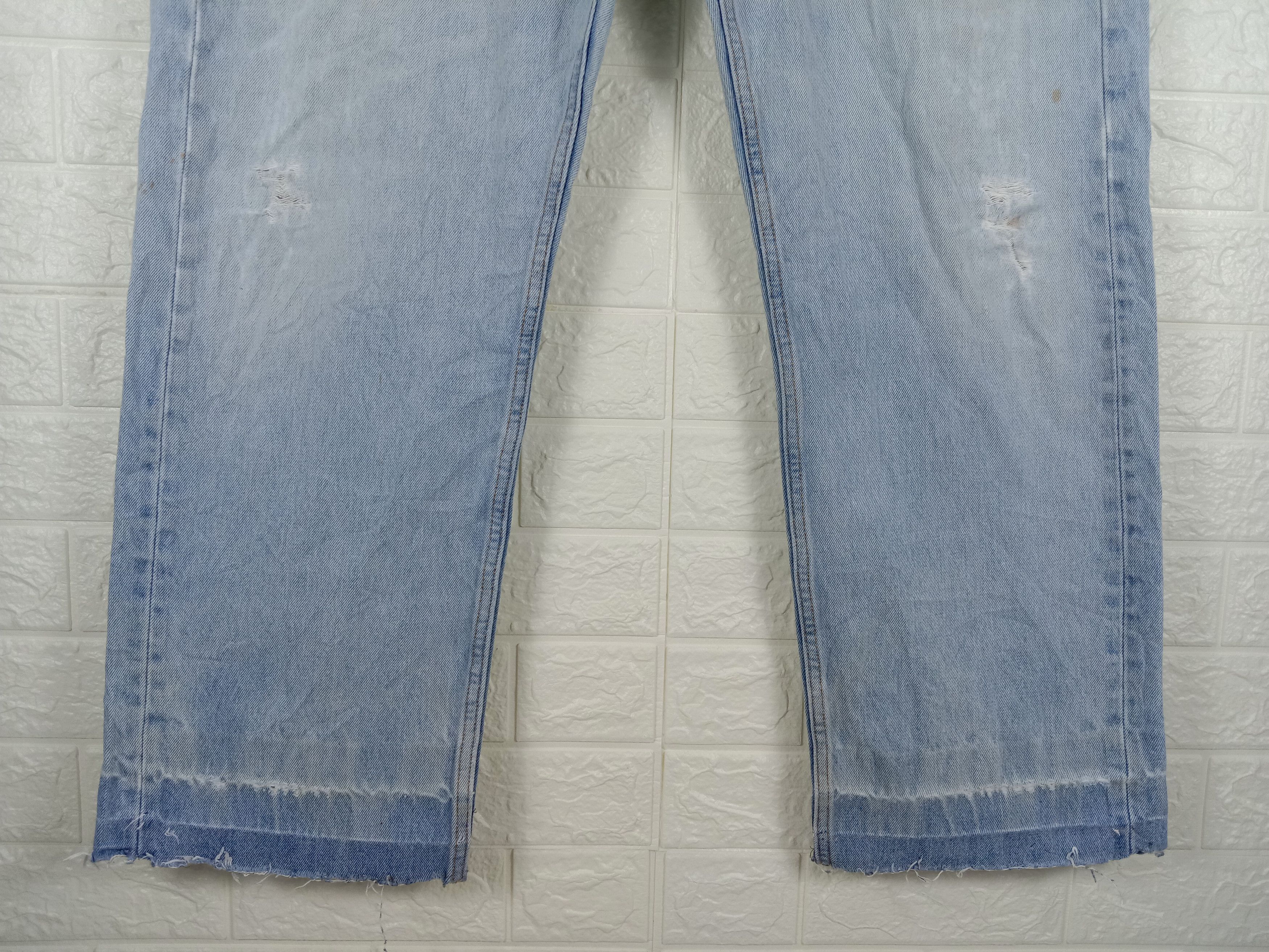 Vintage Levi's 505 Jeans Light Wash Distressed Denim