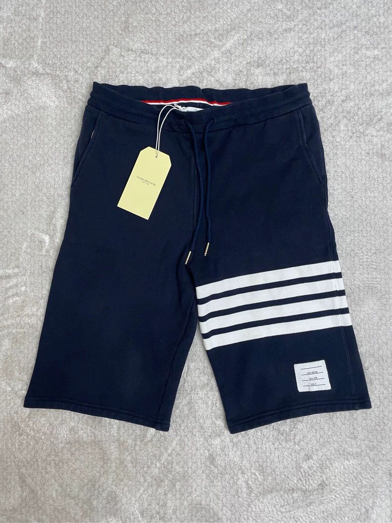 Thom Browne Thom browne Dark blue classic four-striped sports shorts 25 Size US 30 / EU 46 - 1 Thumbnail