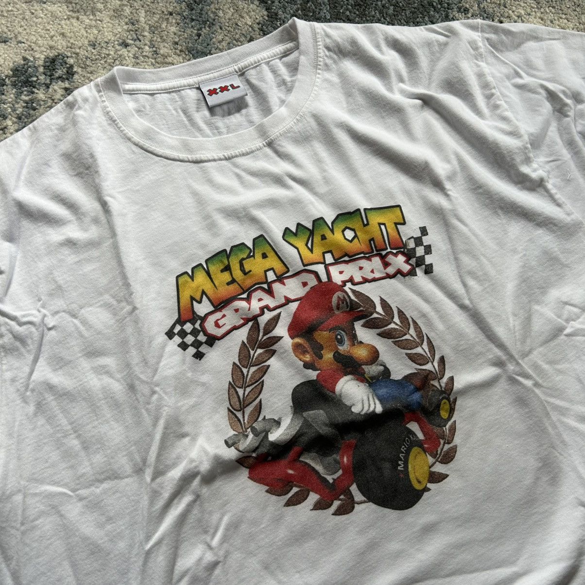 Mega Yacht N64 GRAND PRiX TEE LOS ANGELES NiNTENDO 64 MARiO KART BOXY Size US XXL / EU 58 / 5 - 1 Thumbnail