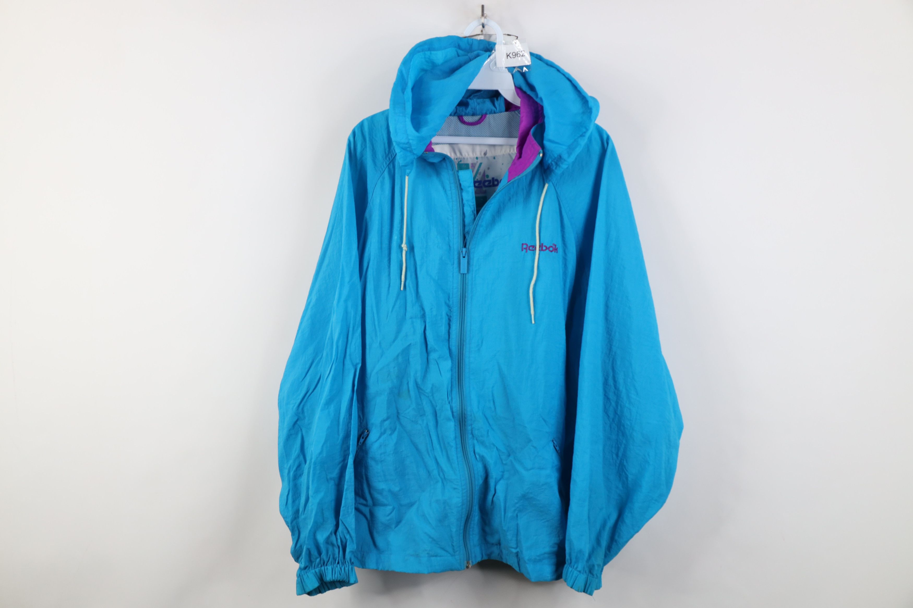 Reebok Vintage 90s Reebok Spell Out Hooded Windbreaker Jacket Size L / US 10 / IT 46 - 1 Thumbnail