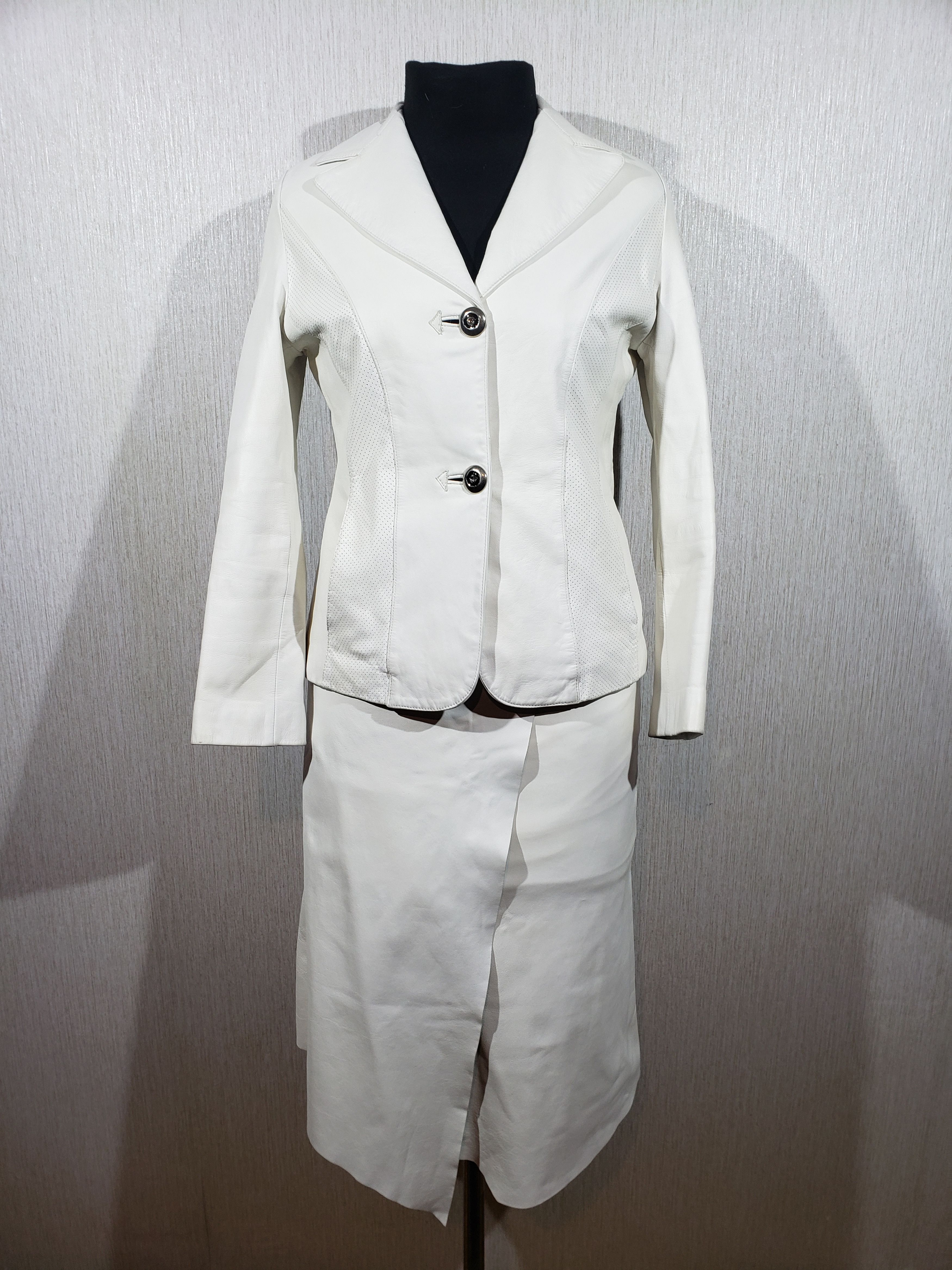 Women's leather jacket with milky skirt.