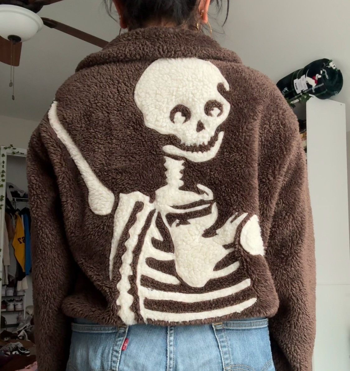 unisex hugging skeleton brown fleece