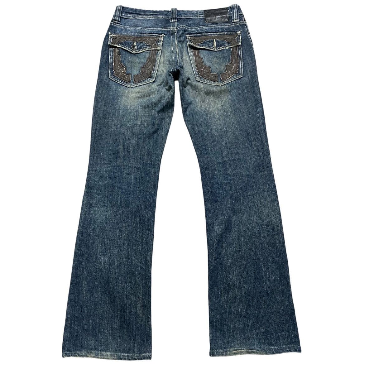 semanticdesign Semantic Design Tri-Zip Distressed Bootcut Flare