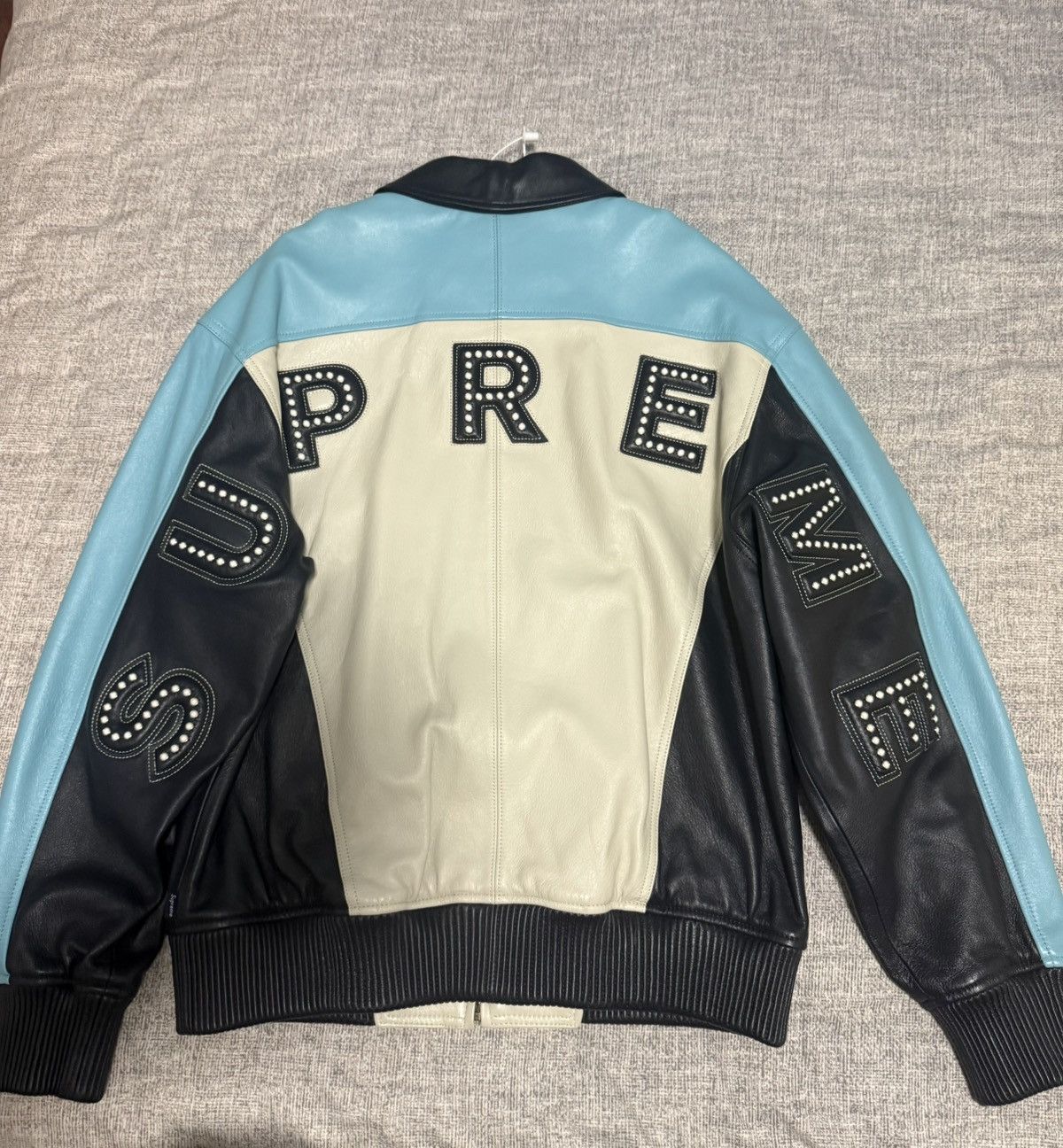 Supreme Supreme studded arc logo leather jacket White blue | Grailed