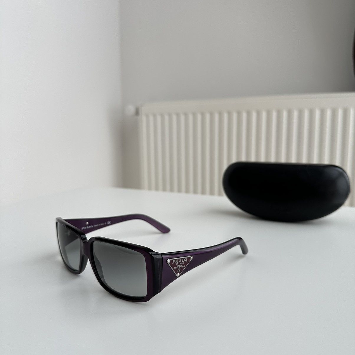 image of Prada Oval Purple Sunglasses With Prada Triangles Spr 16L in Leopard, Women's
