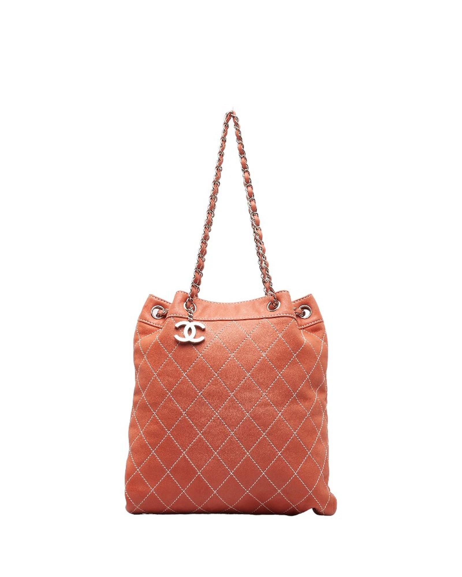 image of Chanel Chic Drawstring Bucket Bag In Excellent Condition in Pink, Women's