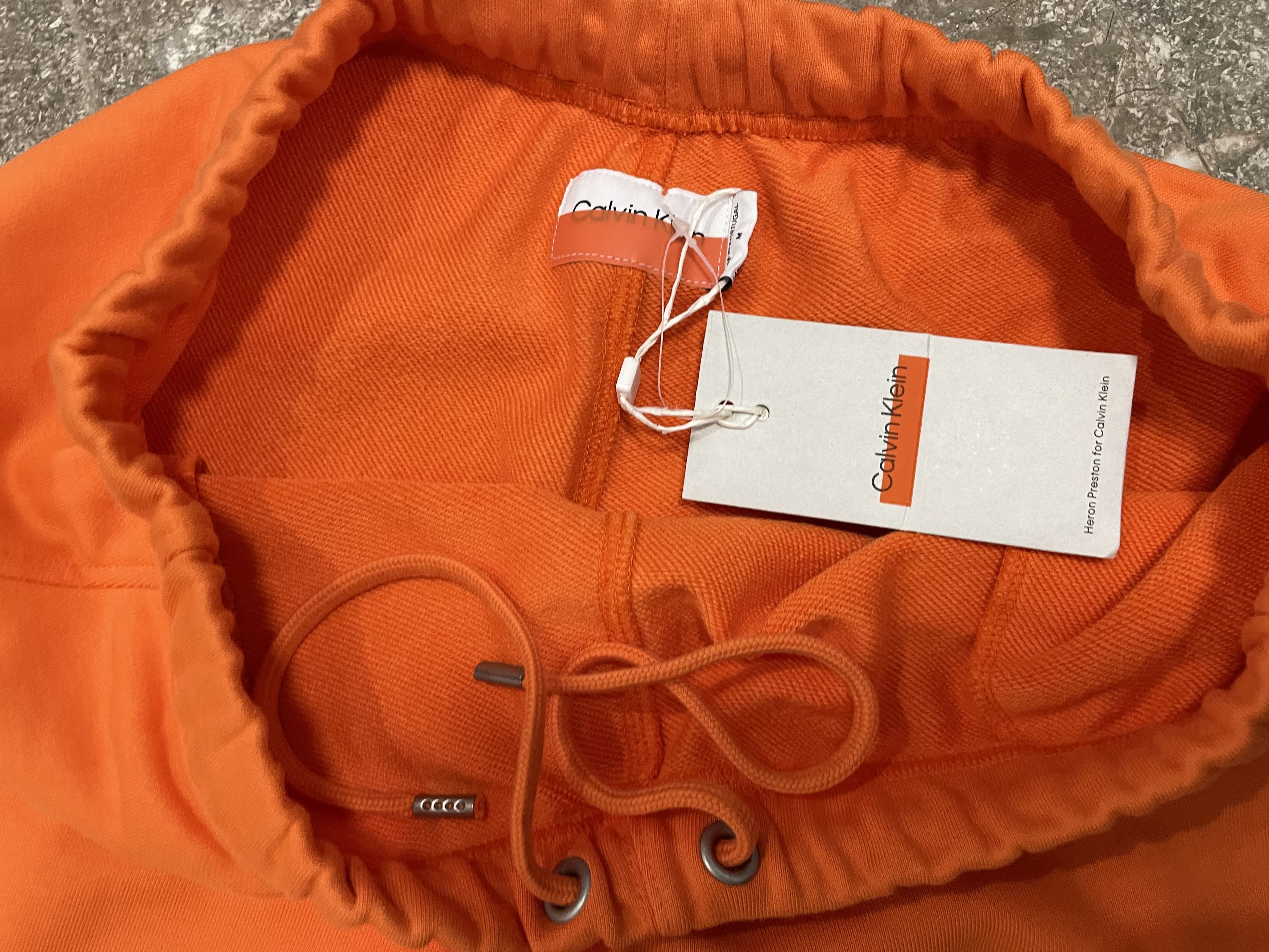 CK x Heron Preston track pants - Orange