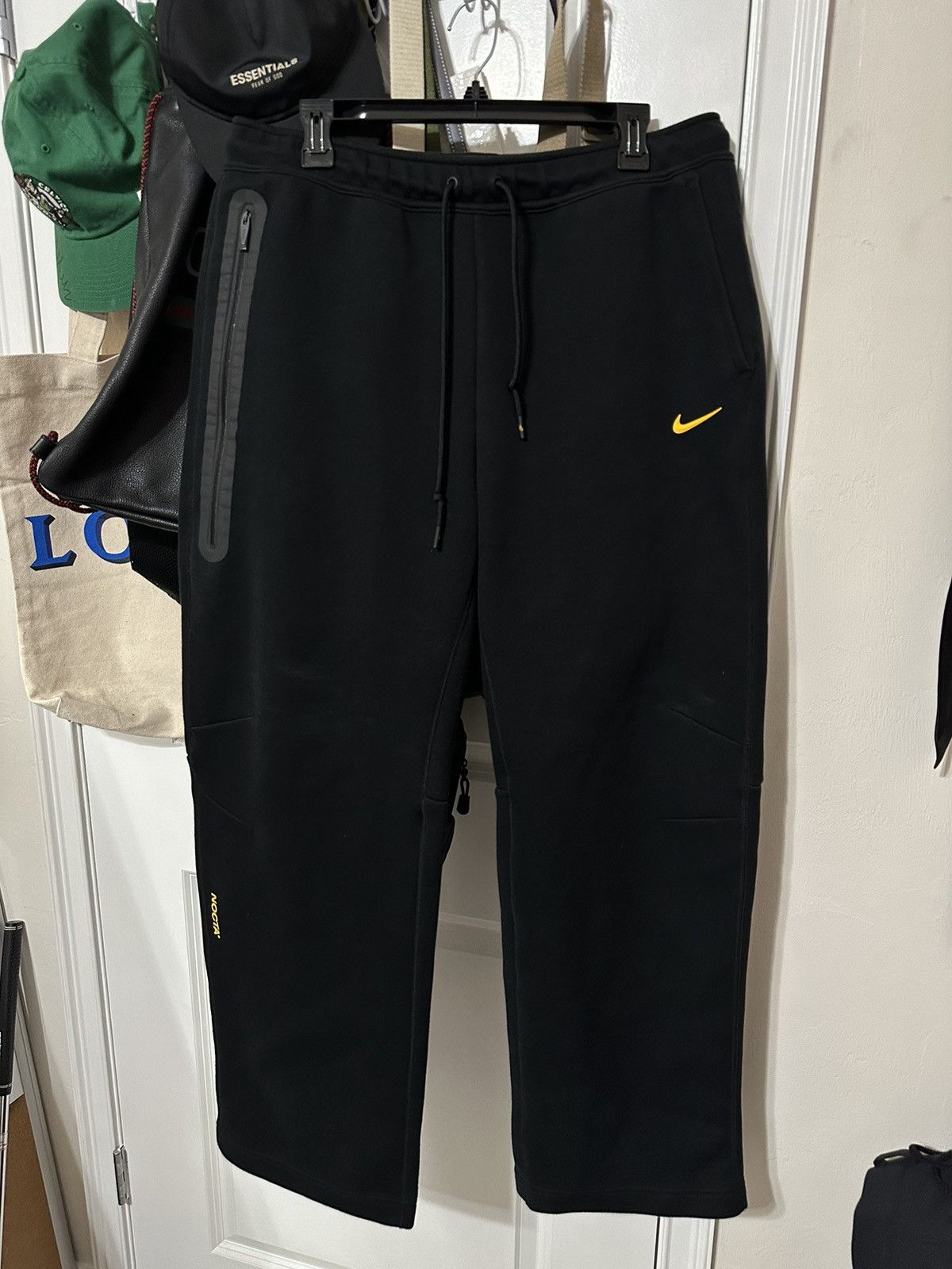 Image of Nike Nocta Tech Fleece Open-Hem Pants in Black, Men's (Size 33)