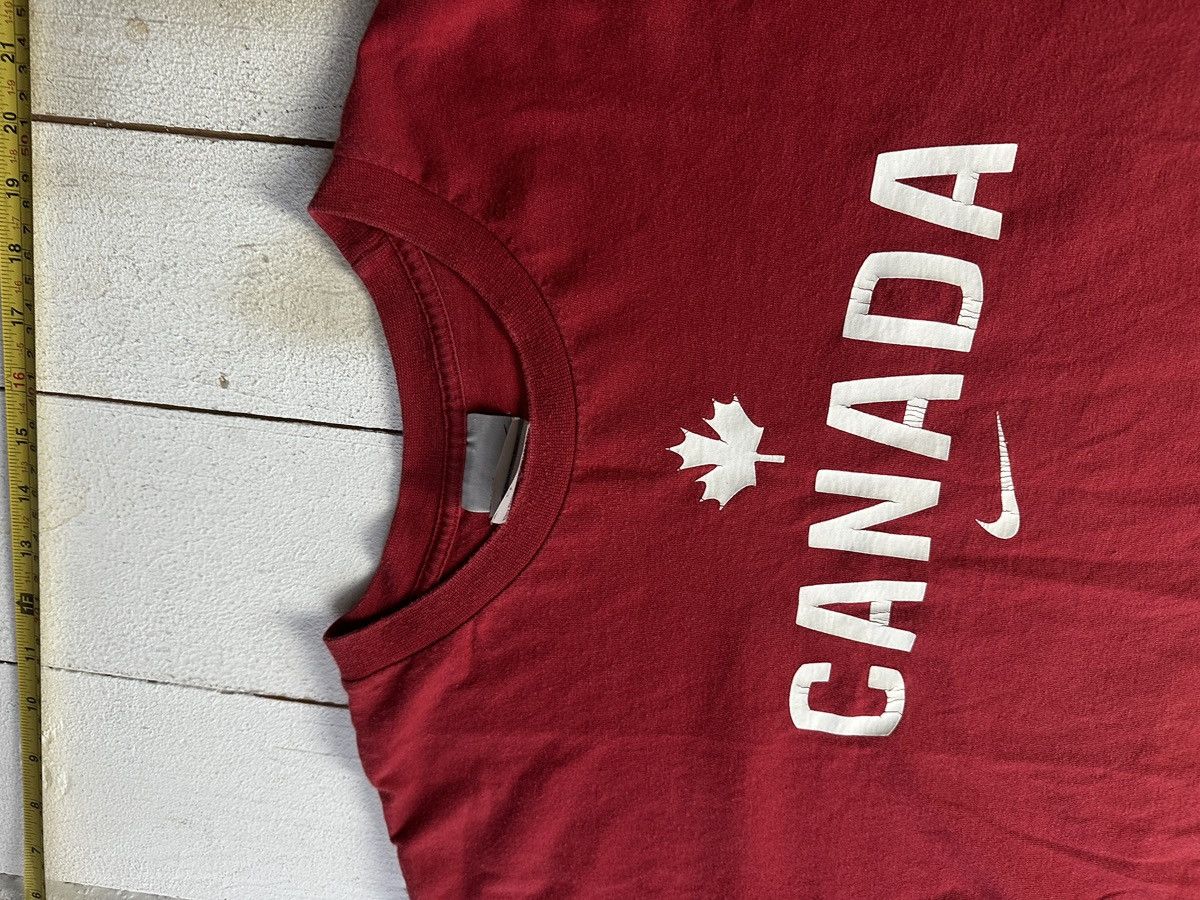 Nike 🚨 NIKE CANADA BIG LOGO SWOOSH NHL RARE BOXY MEN T-SHIRT Size US L / EU 52-54 / 3 - 6 Thumbnail