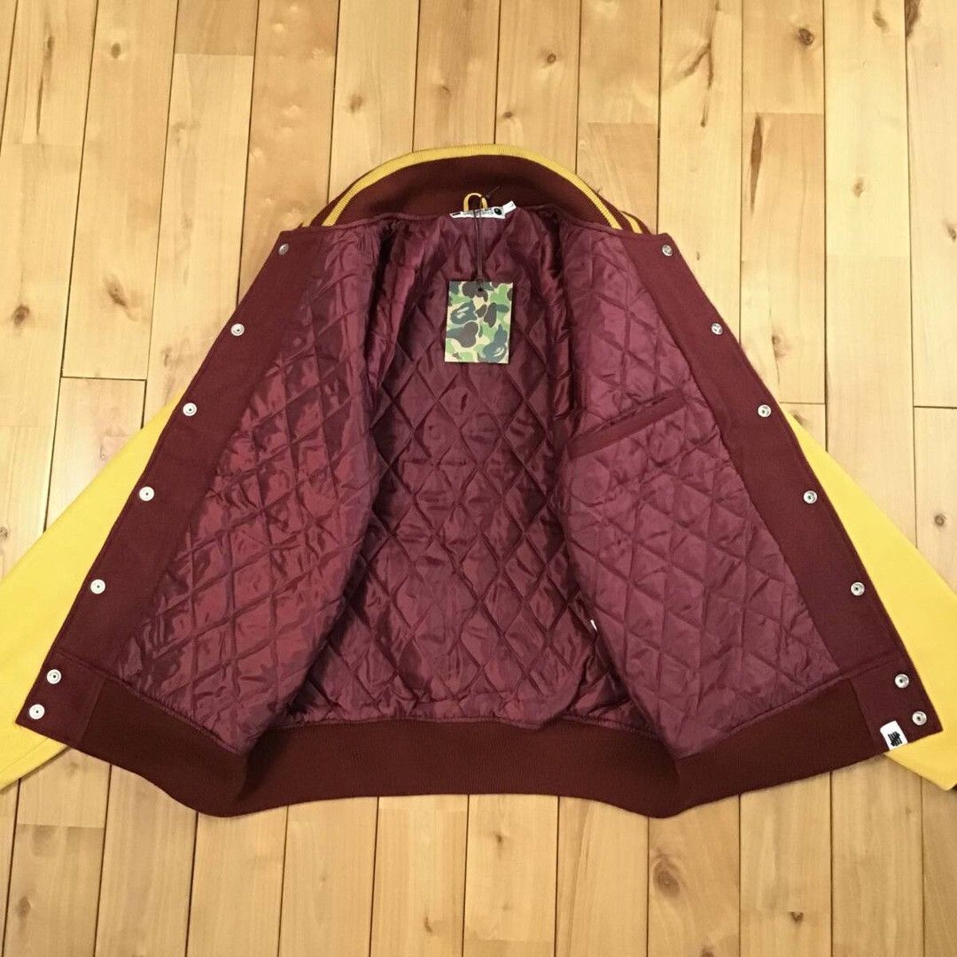 Bape × Undefeated 2012 Undefeated × BAPE leather varsity jacket a bathing ape Size US L / EU 52-54 / 3 - 8 Thumbnail